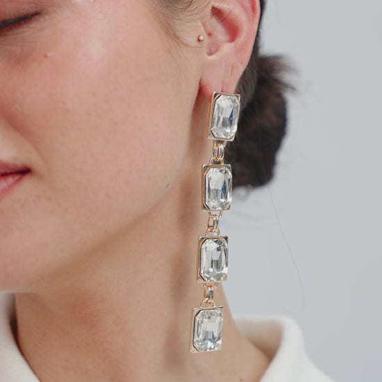 Four Crystal Stone Drop Earrings on model in video