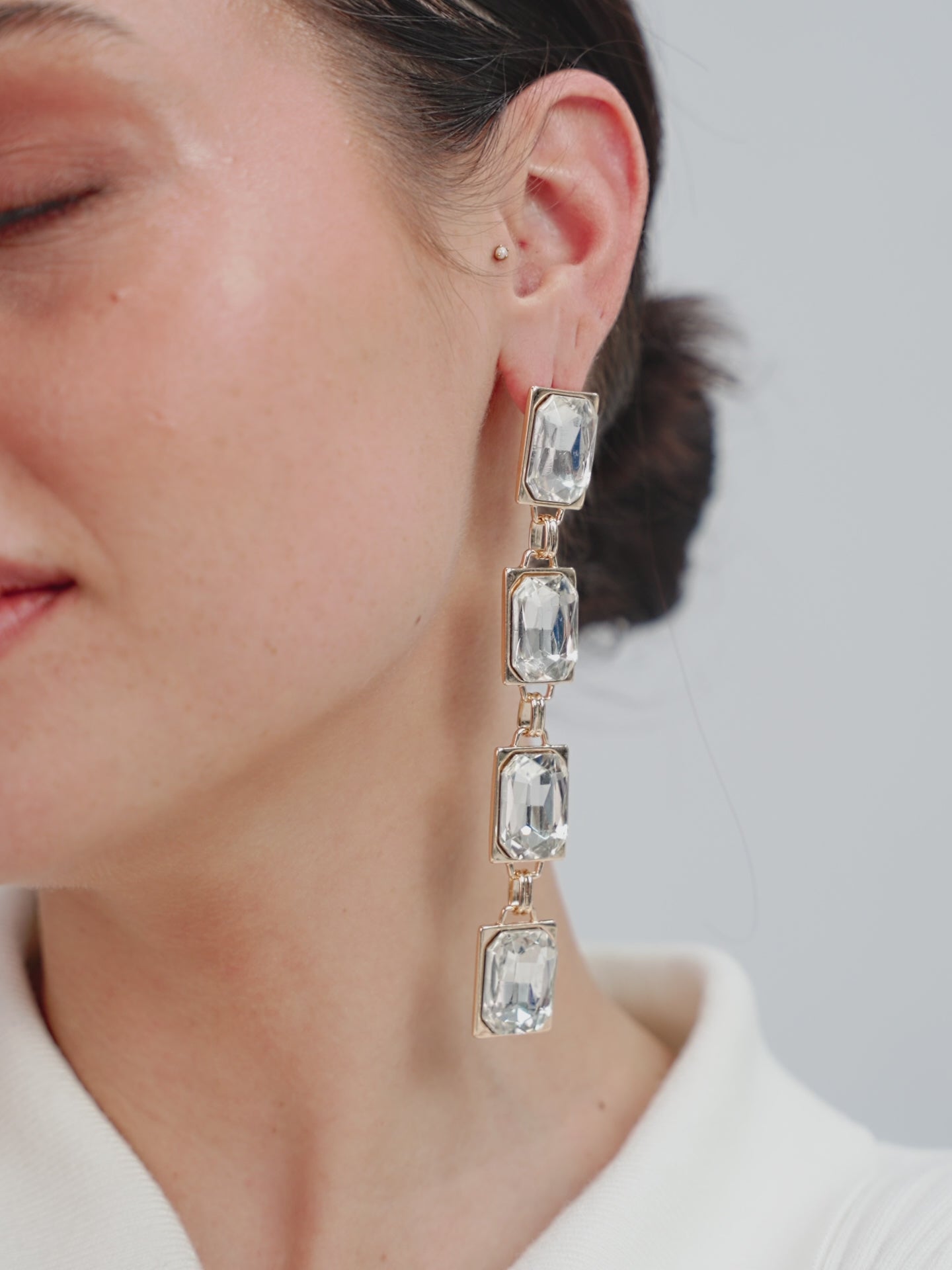 Four Crystal Stone Drop Earrings on model in video