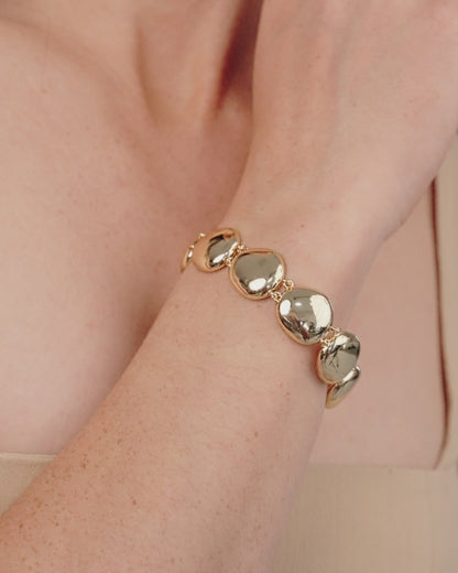 Polished Pebble Linked Bracelet in gold in video