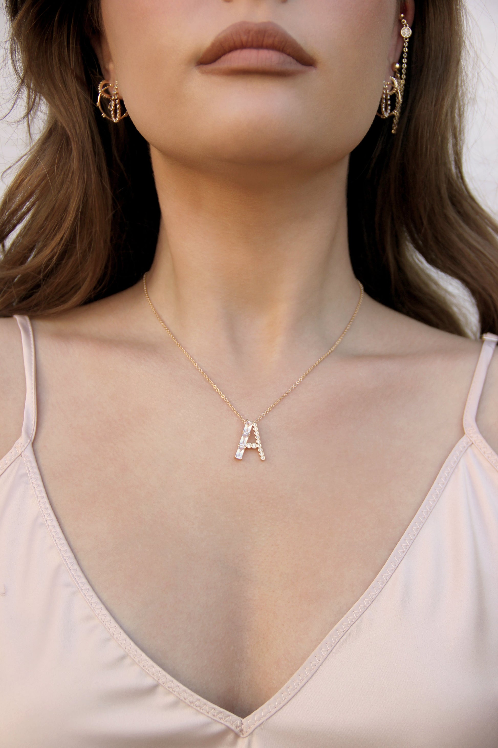 Mixed Crystal Initial Necklace on a model