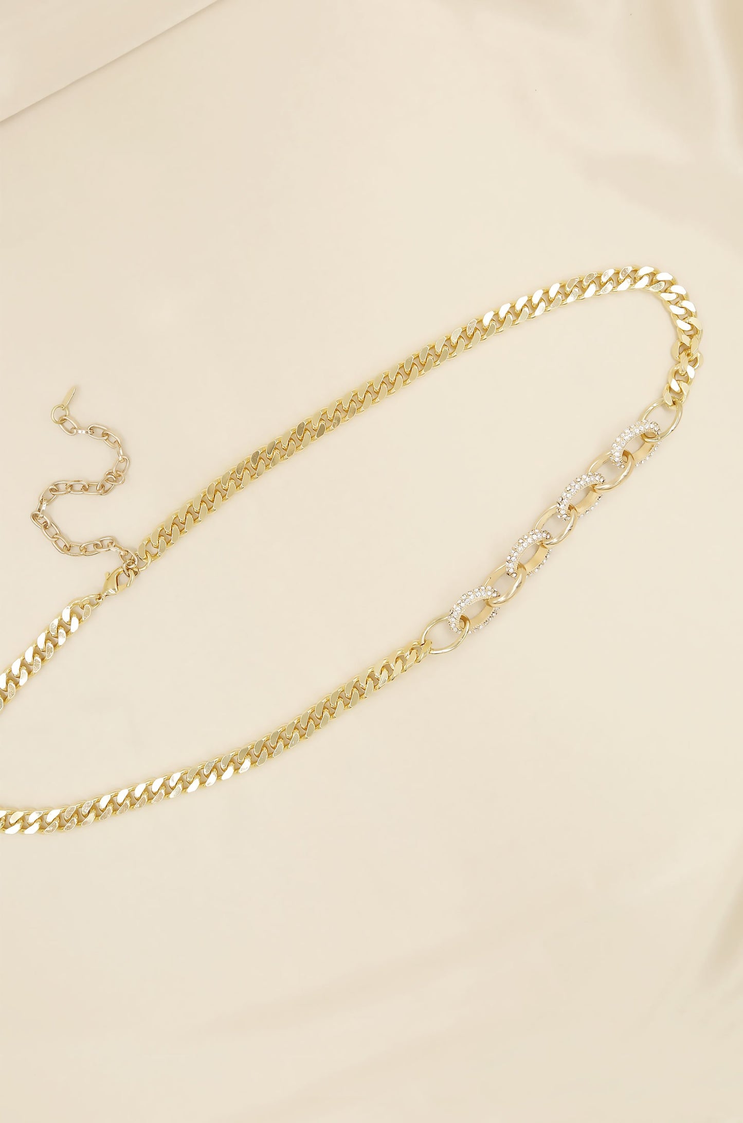 Crystal Interlocking Loops Chain Belt on slate background