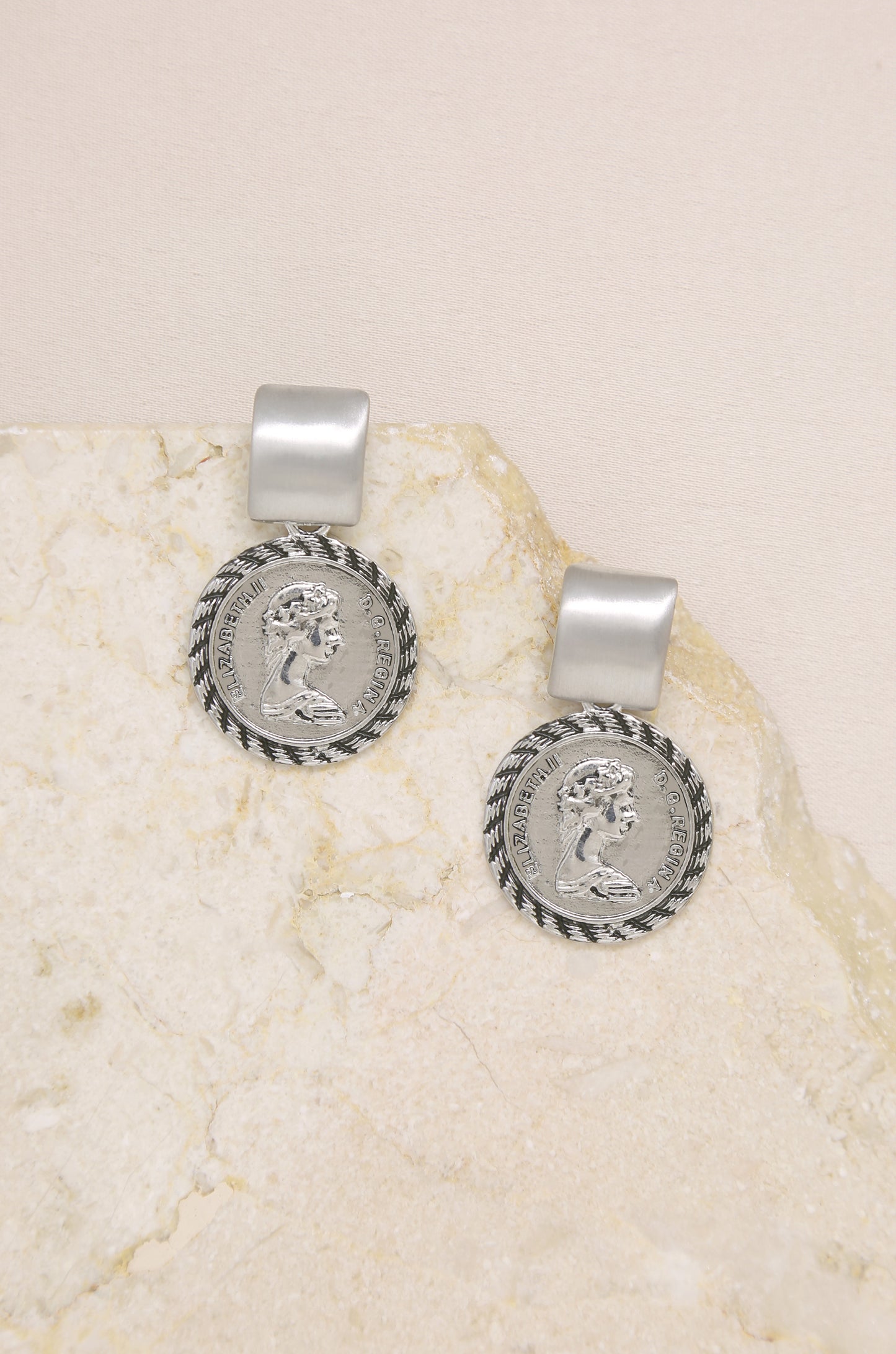 Mini Ancient Coin Earrings on slate background