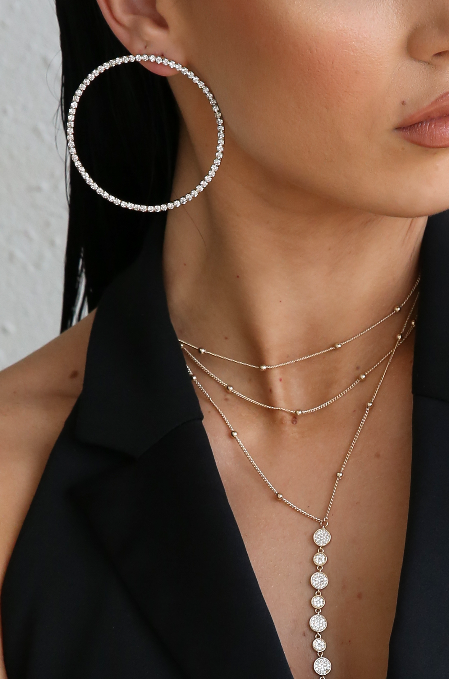 Picture Perfect Crystal Circle 18k Gold Plated Earrings shown on a model