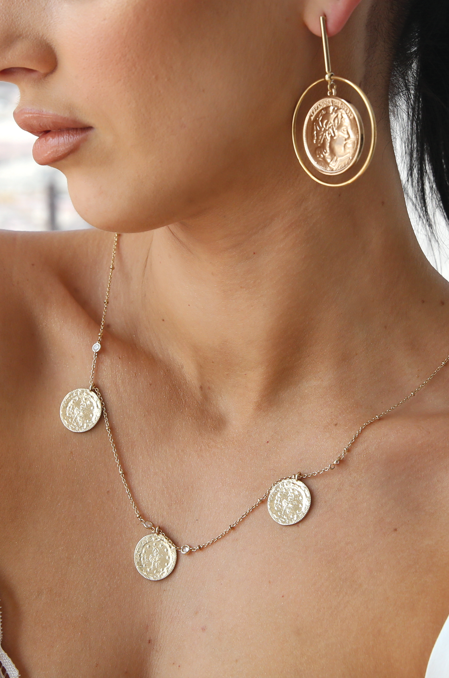 Lady Luck 18k Gold Plated Coin Dangle Statement Earrings shown on a model