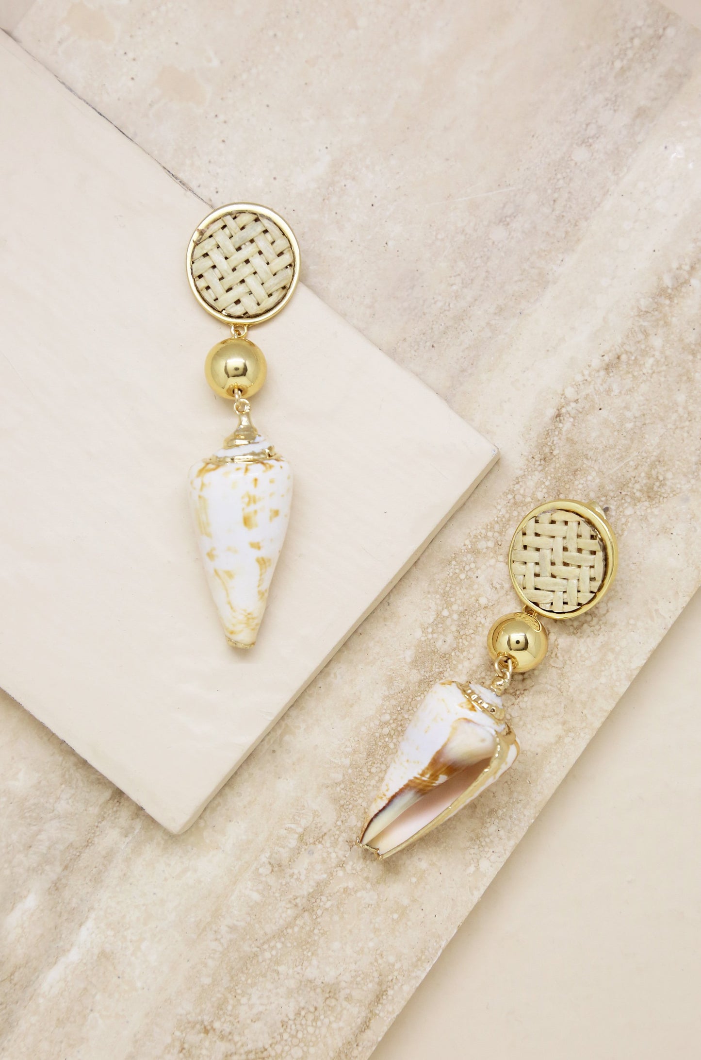 Nautical Shell & 18k Gold Plated Dangle Earrings on slate background