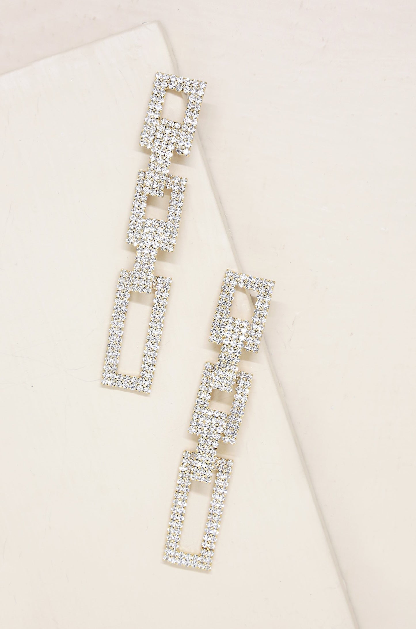 Crystal Rectangle Chain Link 18k Gold Plated Earrings on slate background