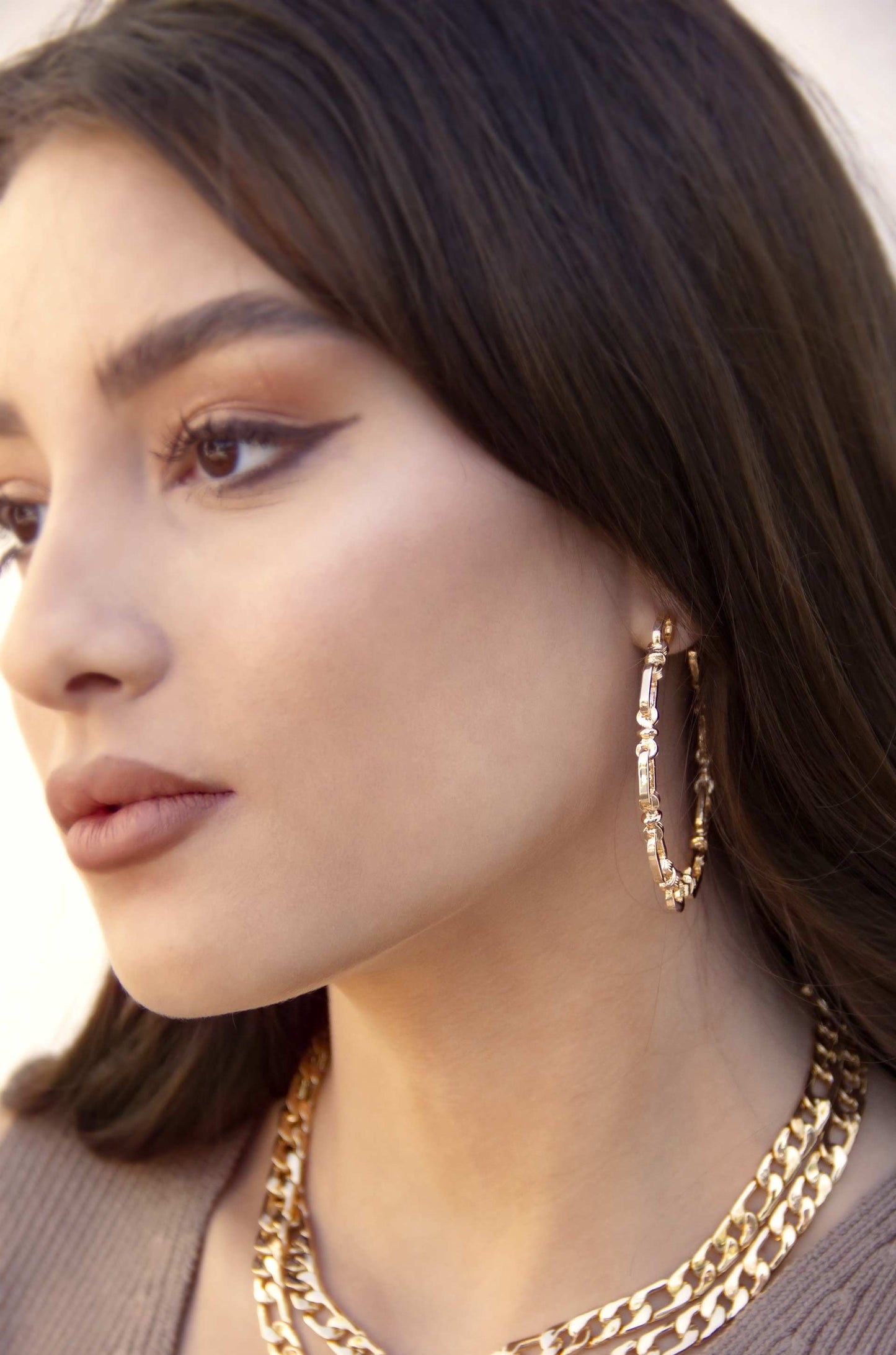 Geometry Hoop Earrings on model 2
