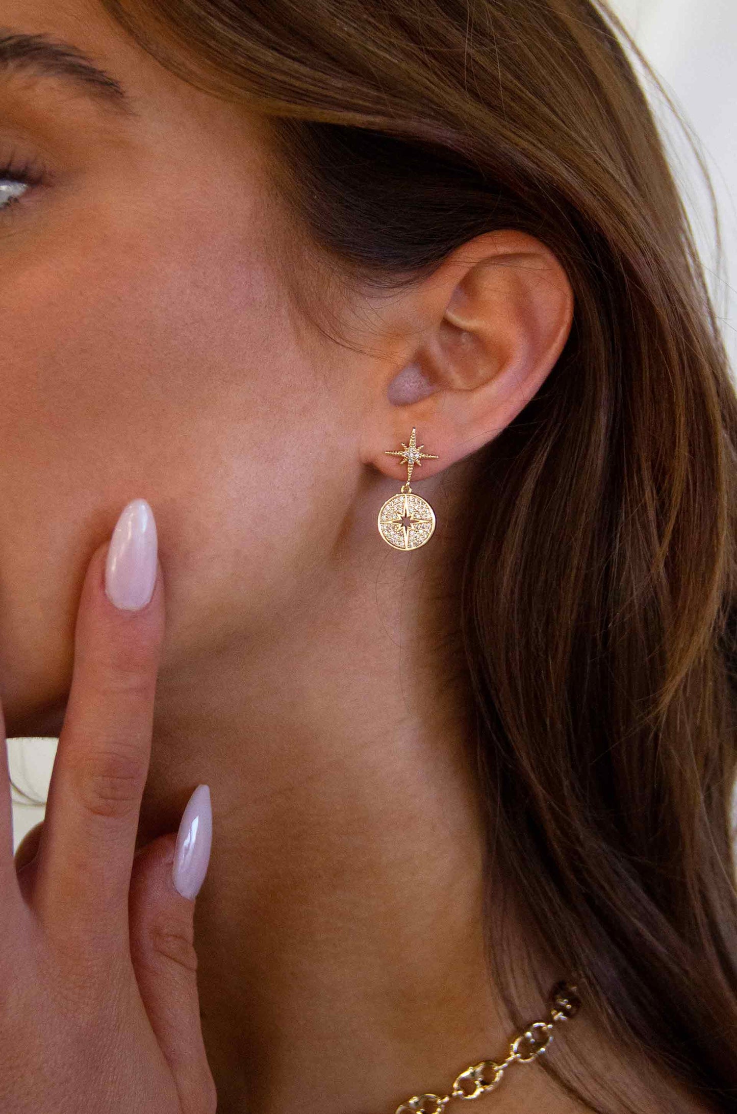Crystal Eclipse 18k Gold Plated Earrings on a model