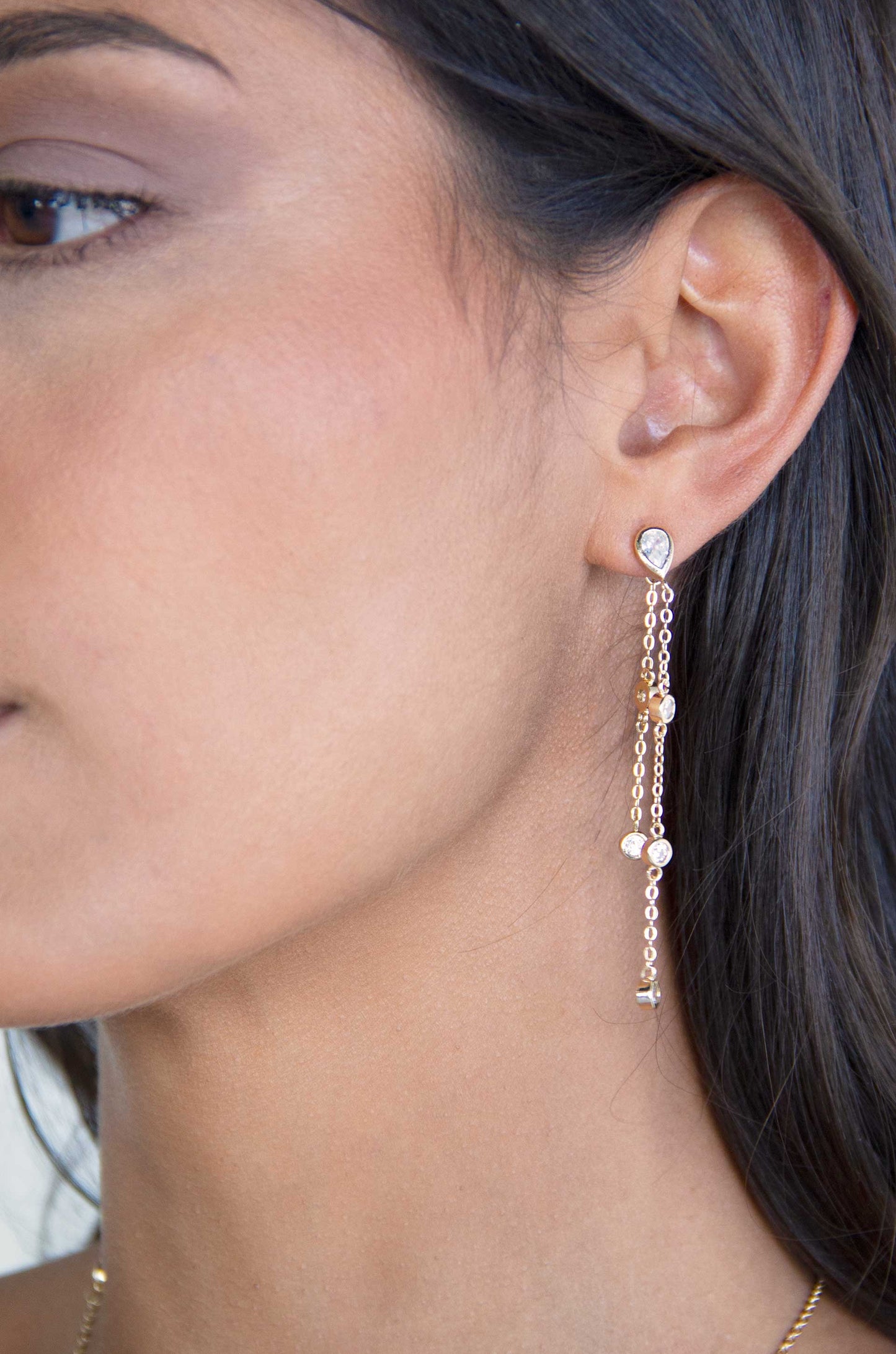 Dripping Chain 18k Gold Plated Dangle Earrings on a model