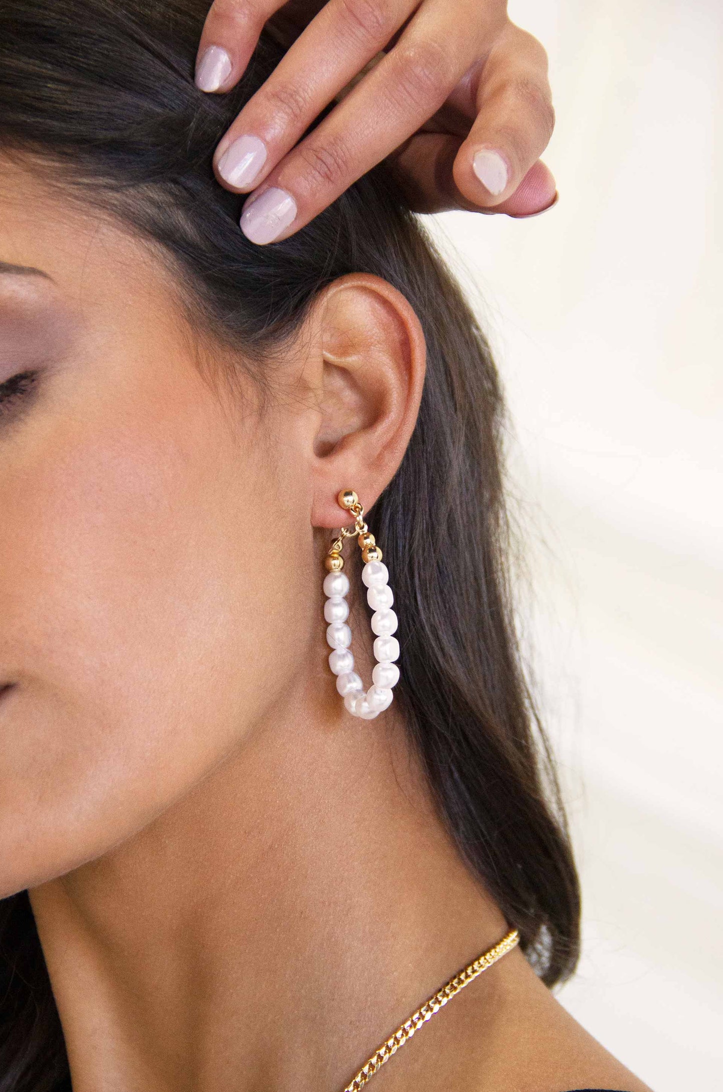 Pearl and 18k Gold Plated Ball Chain Drop Earrings on a model