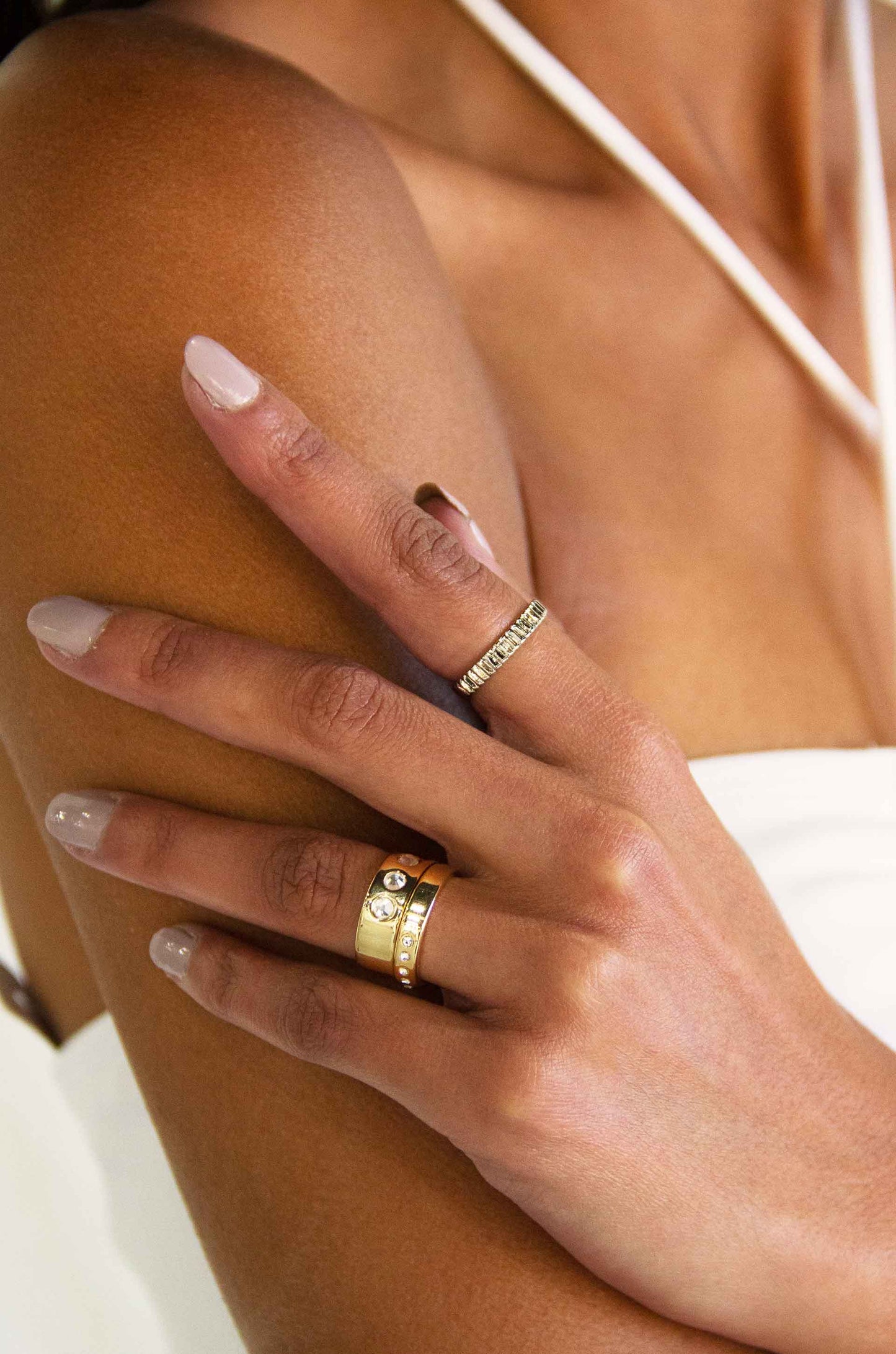 Mixed Metal Rhodium and 18k Gold Plated Ring Set on a model