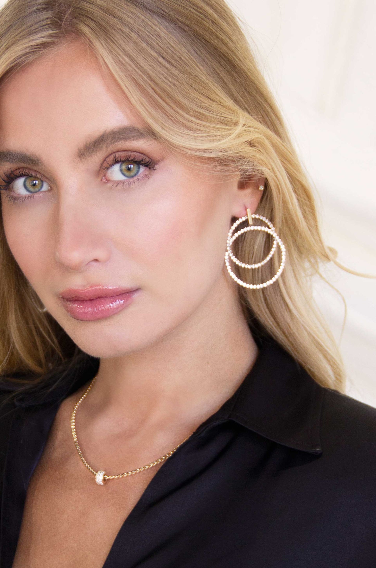 Crystal Dangle Loops Earrings on model