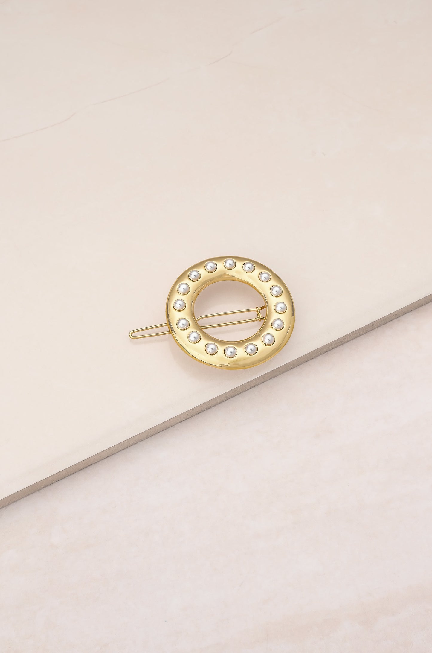 Classic Golden Donut Barrette on slate