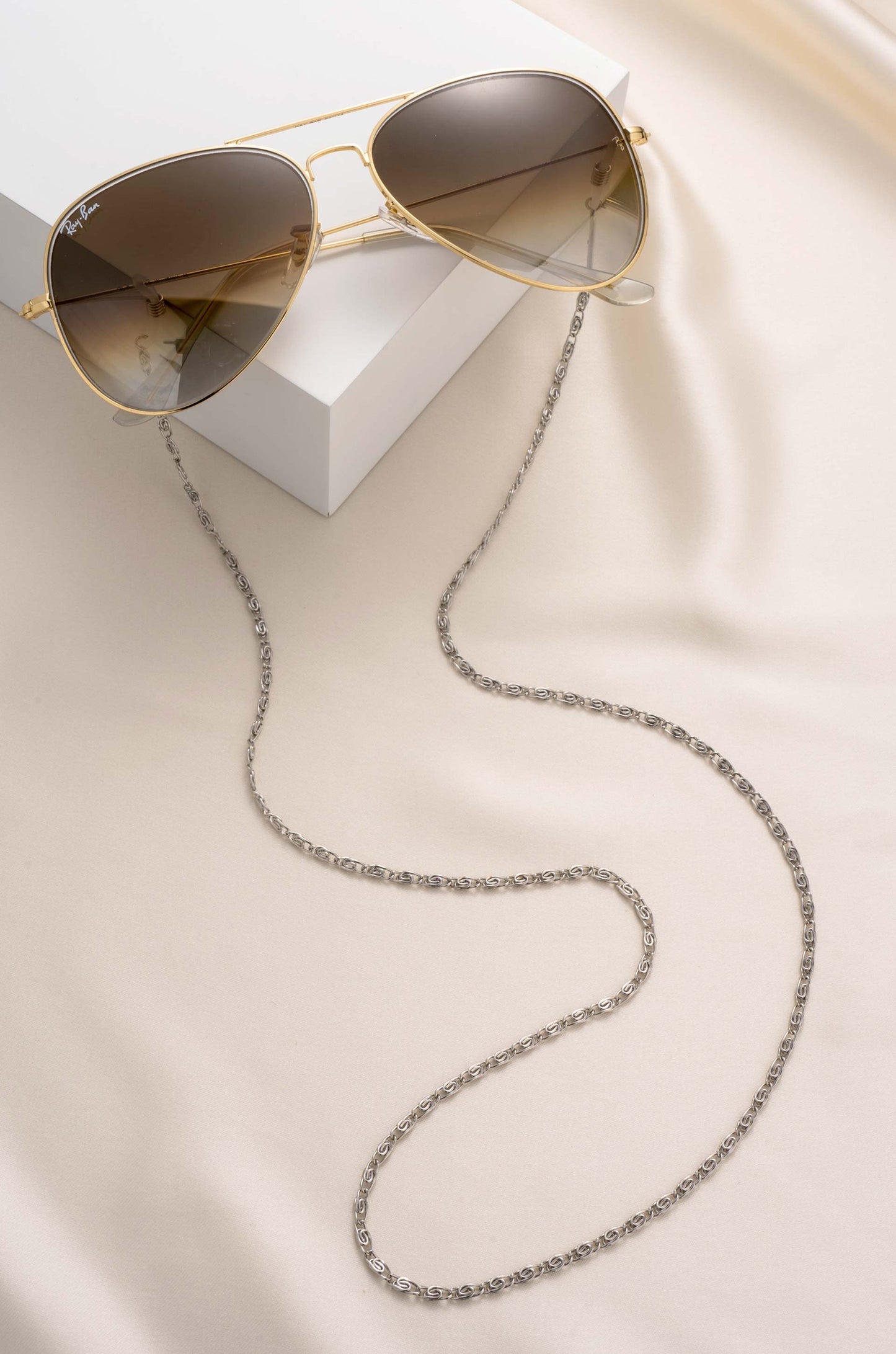 Level Up Glasses Chain in rhodium on slate