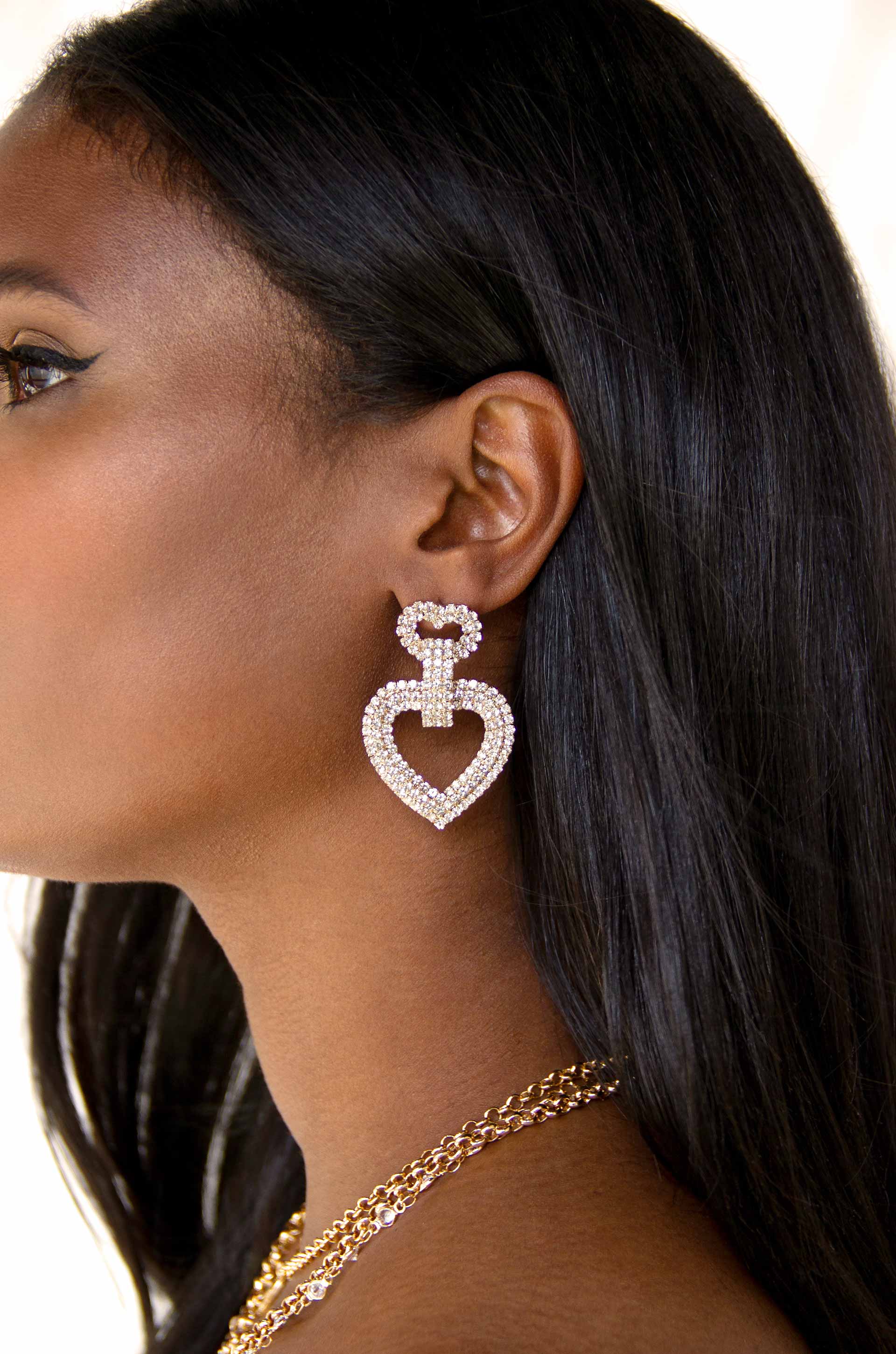 Dove Drop Heart Crystal Earrings on model