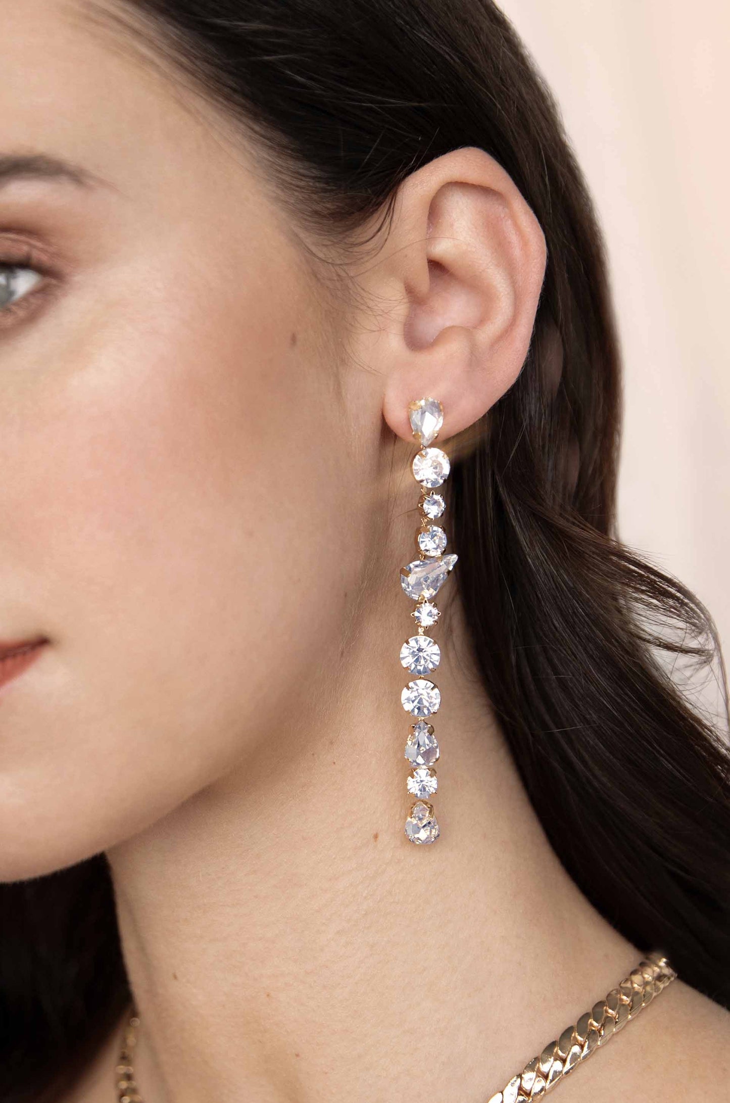 Ice Drop 18k Gold Plated Dangle Earrings on a model