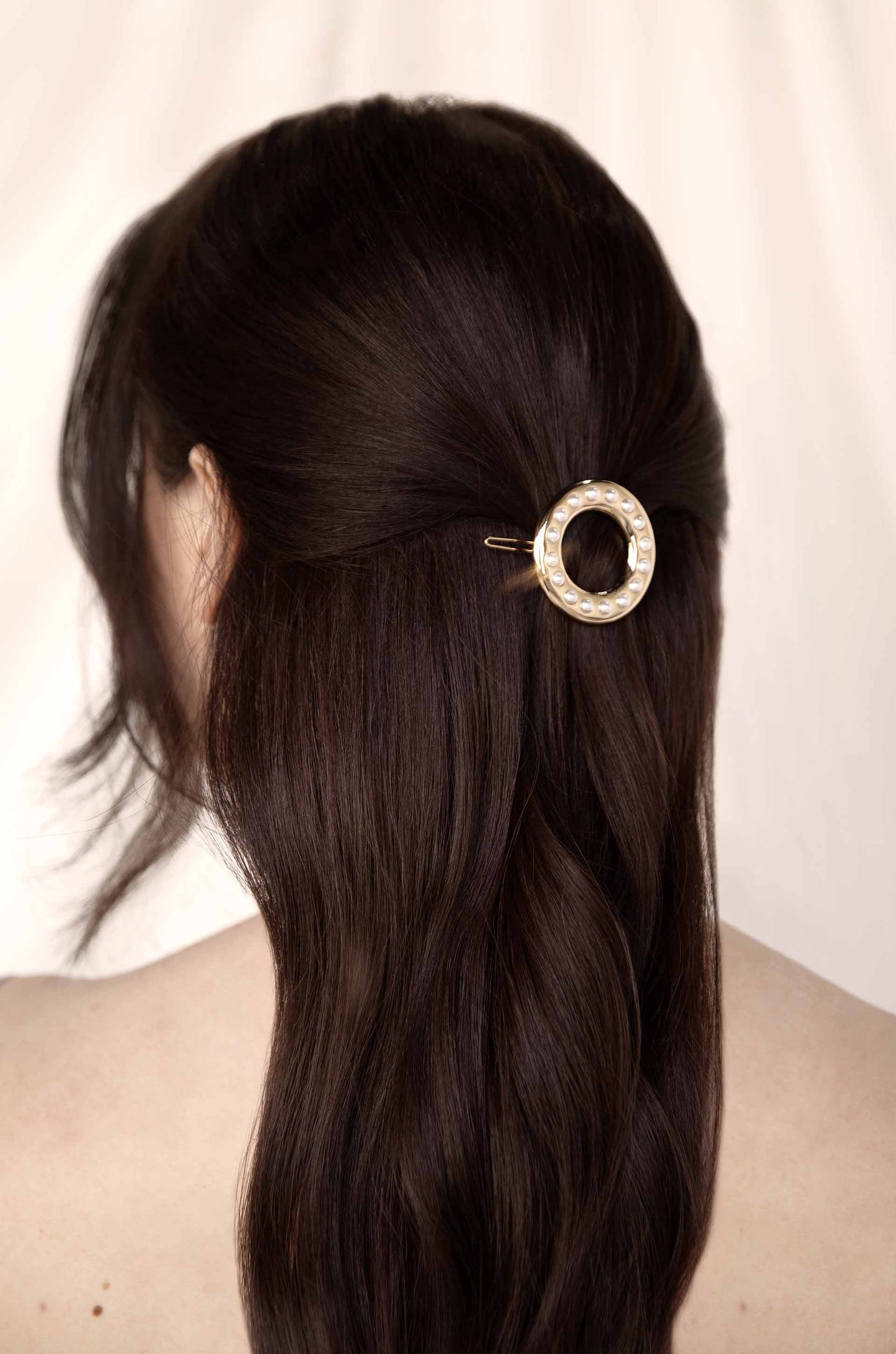 Classic Golden Donut Barrette on a model