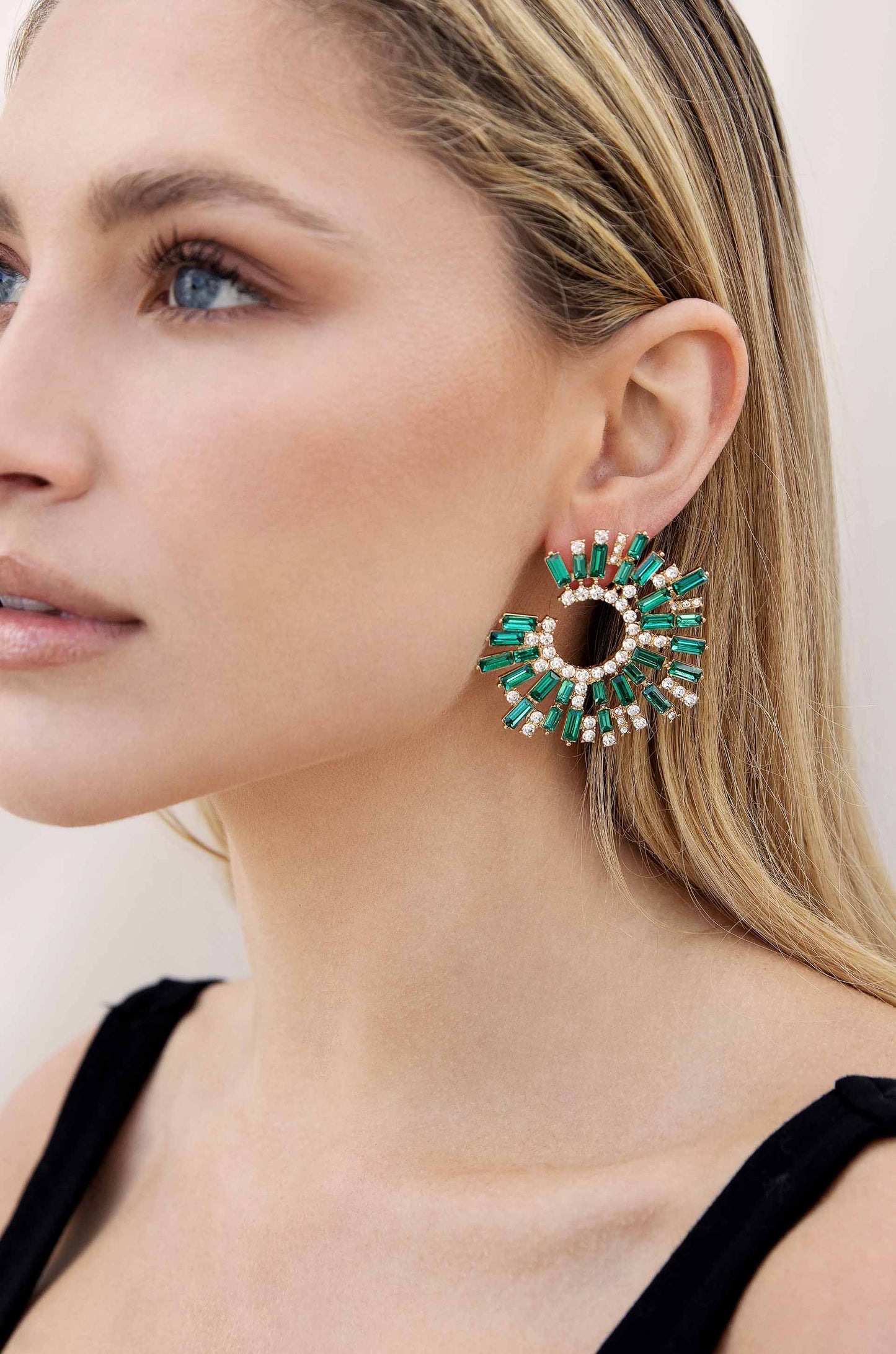 Opulent Crystal Stardust Open Circle Earrings in green model