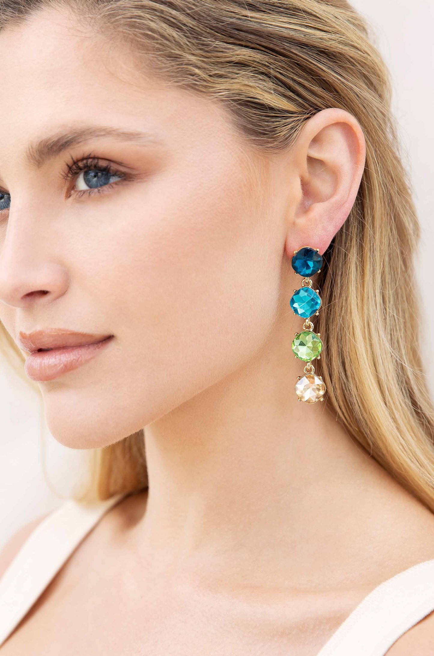Four the Money Earrings on model 6