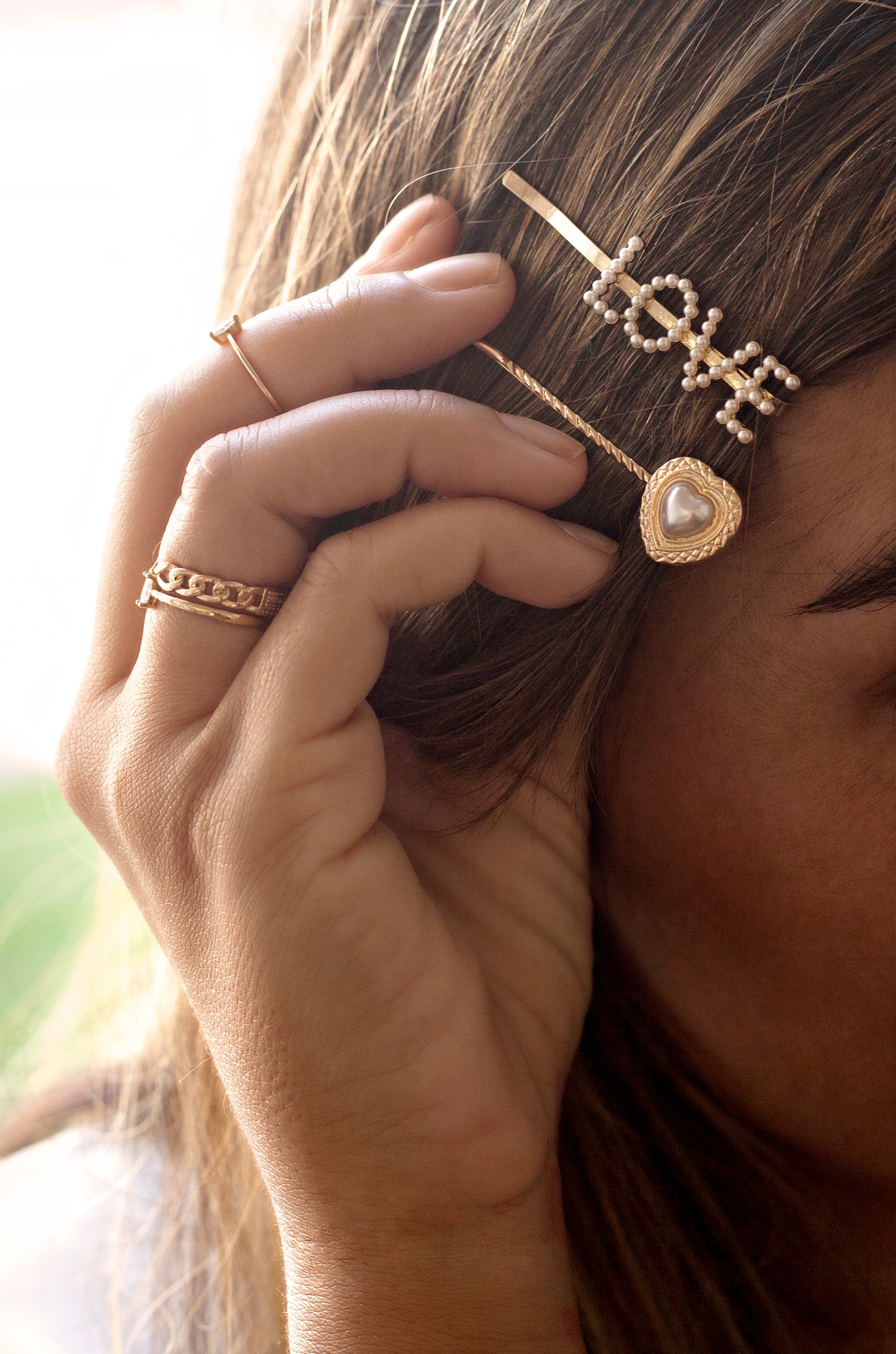 Pearl & Gold Love Heart Hair Pin Set shown on a model