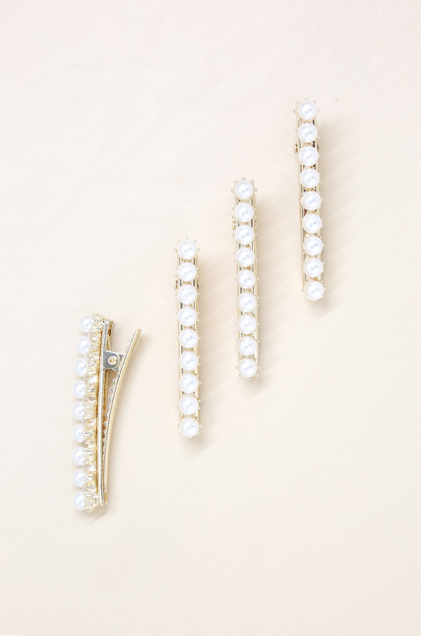 Diana Pearl Clip Set on slate background