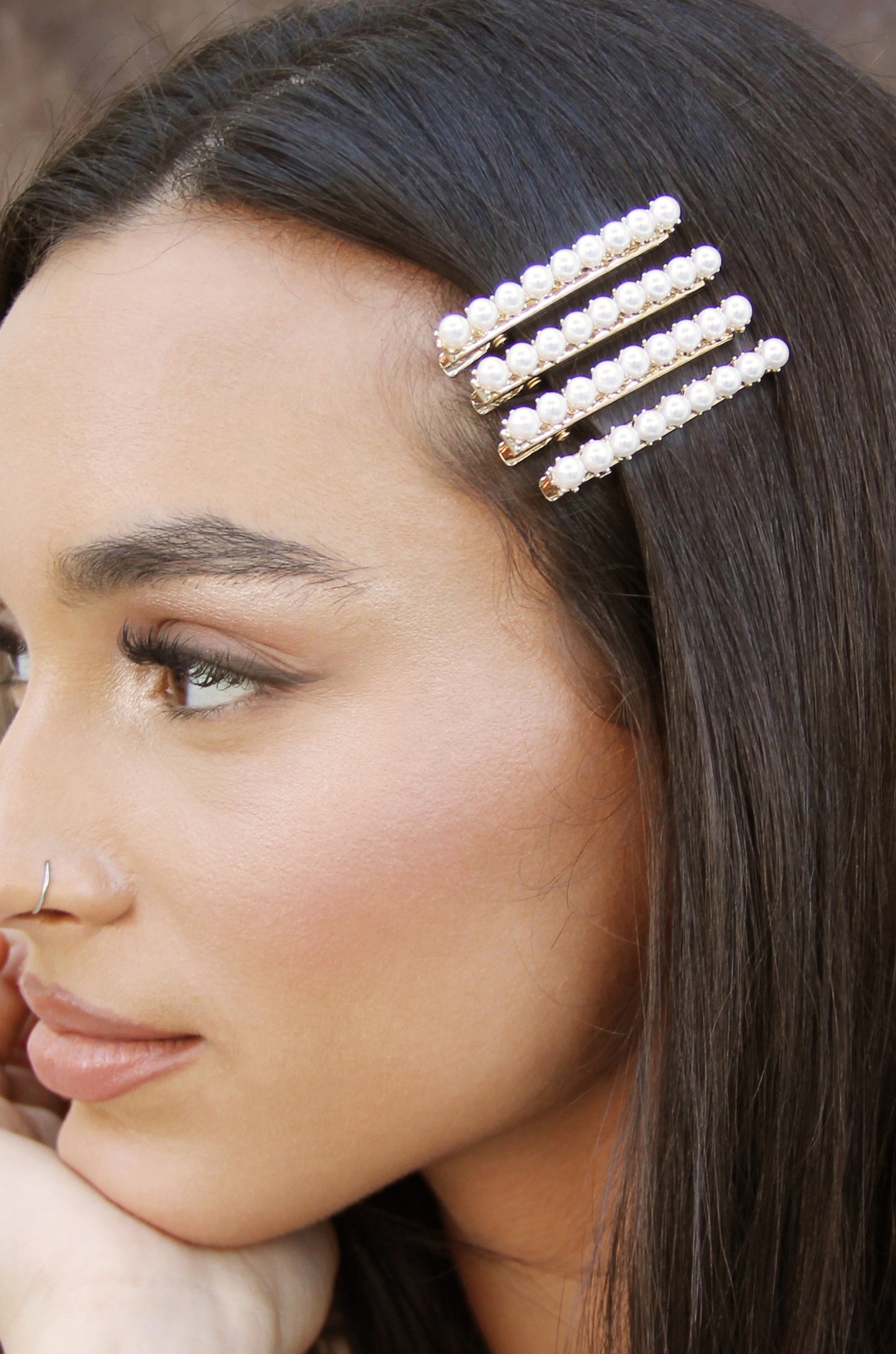 Diana Pearl Clip Set shown on a model