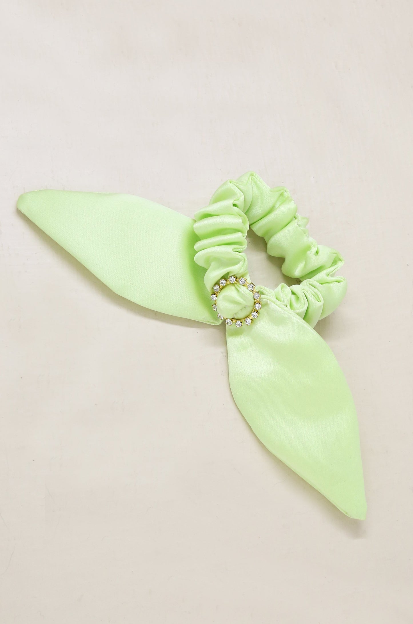Neon Scrunchie with Crystal in Lime Green on slate background