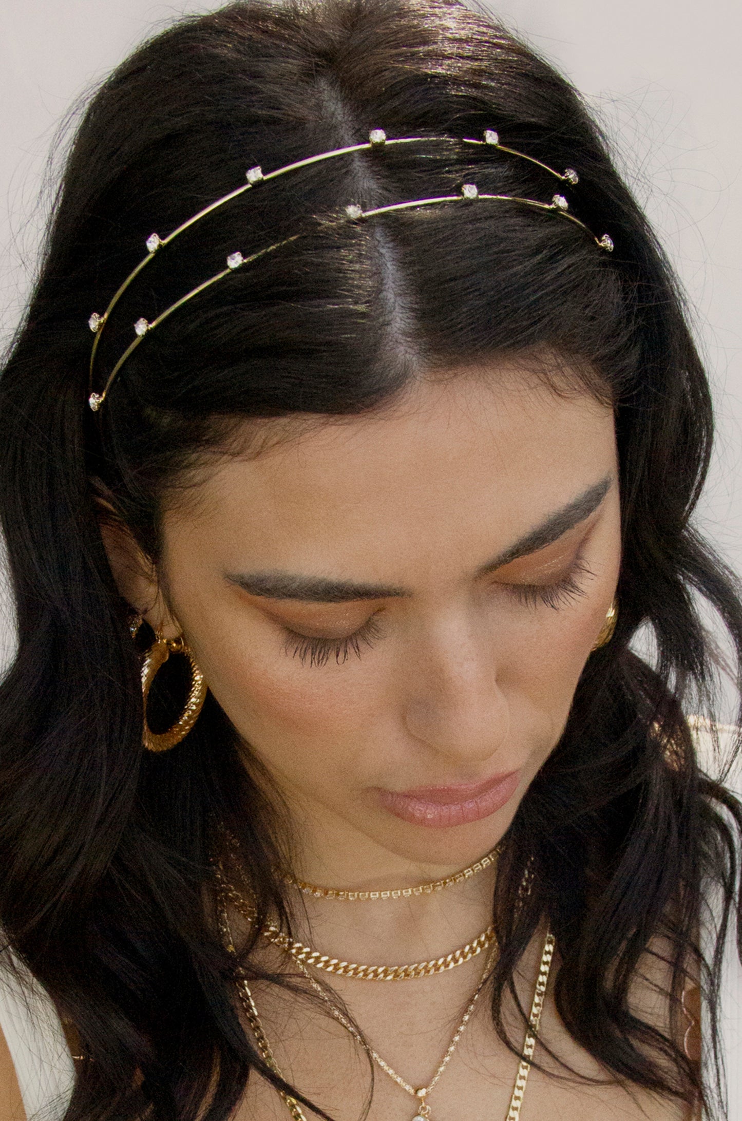 Delicate Crystal Dotted Gold Headband shown on a model