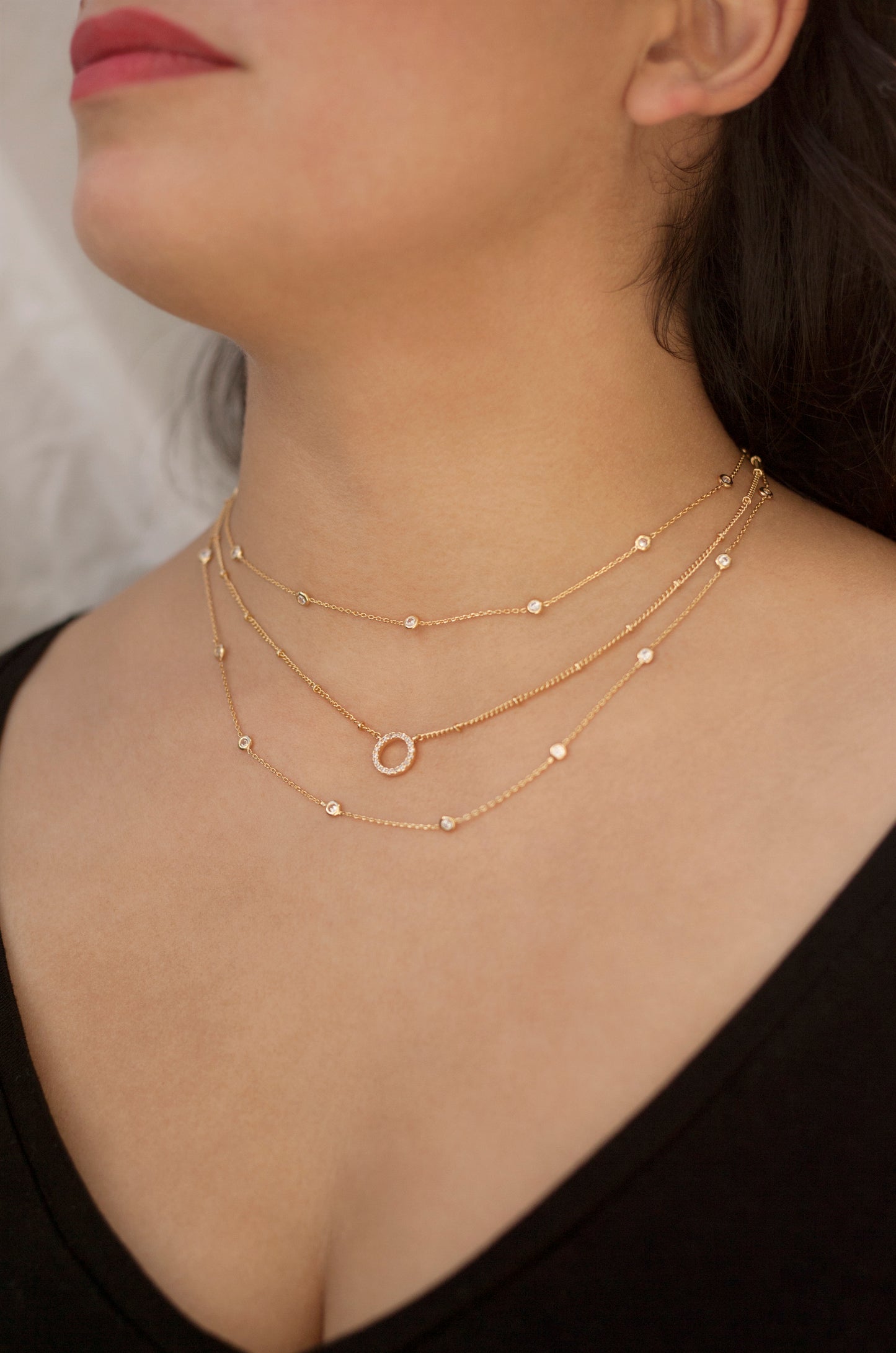 Monroe Crystal Strand Layered Necklace shown on a model  