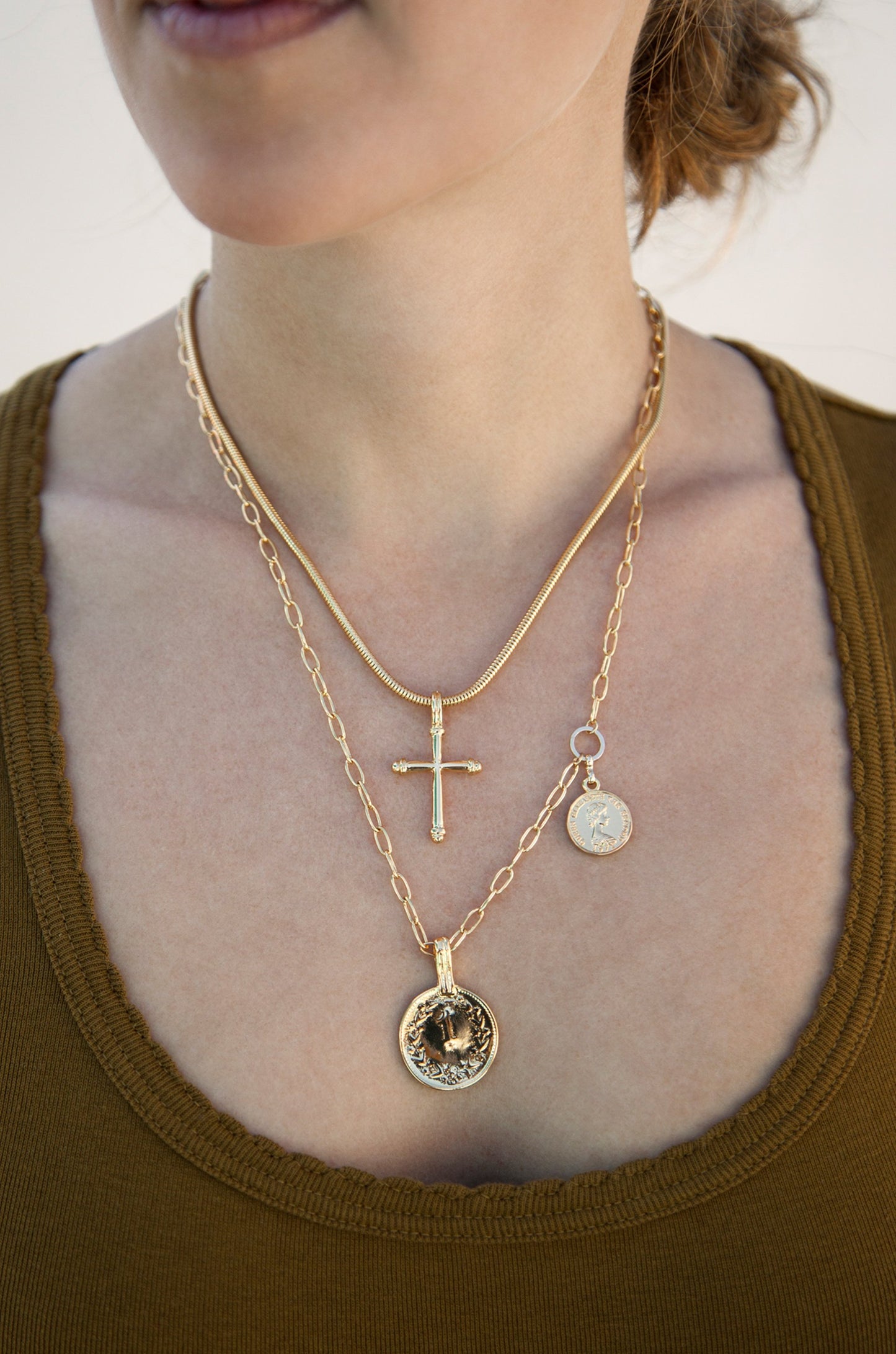 Keep the Faith 18k Gold Plated Cross and Coin Necklace Set shown on a model