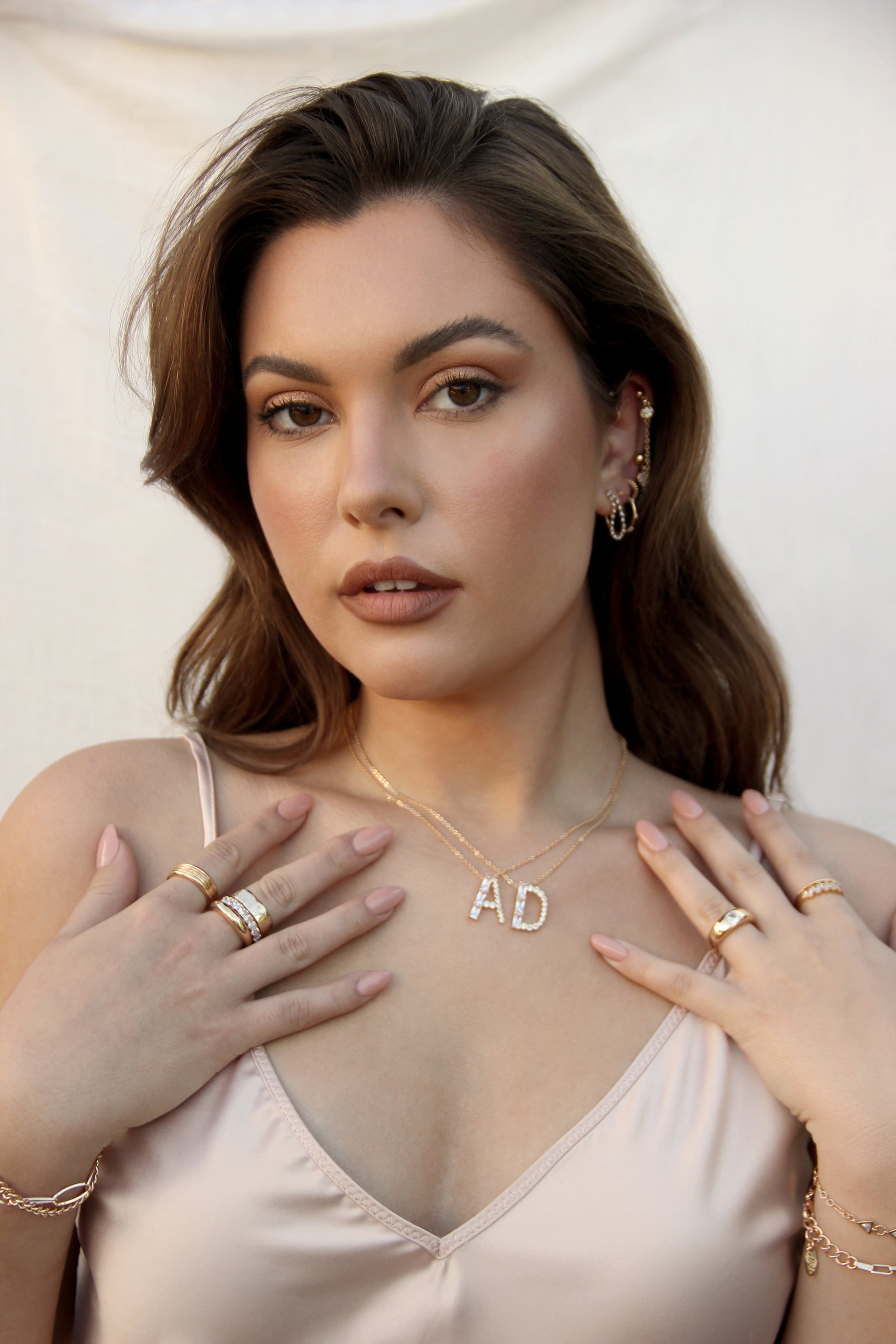 Letters A and D Mixed Crystal Initial Necklace shown on a model