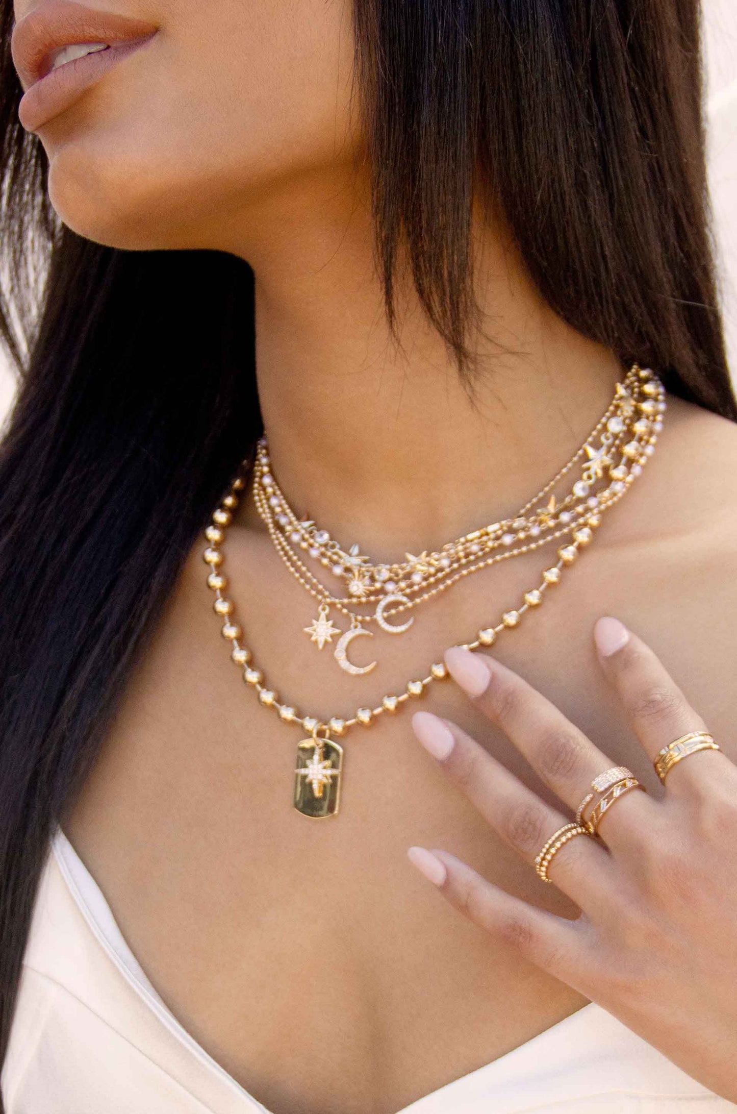 Star Power and Crystal Strand 18k Gold Plated Necklace on a model