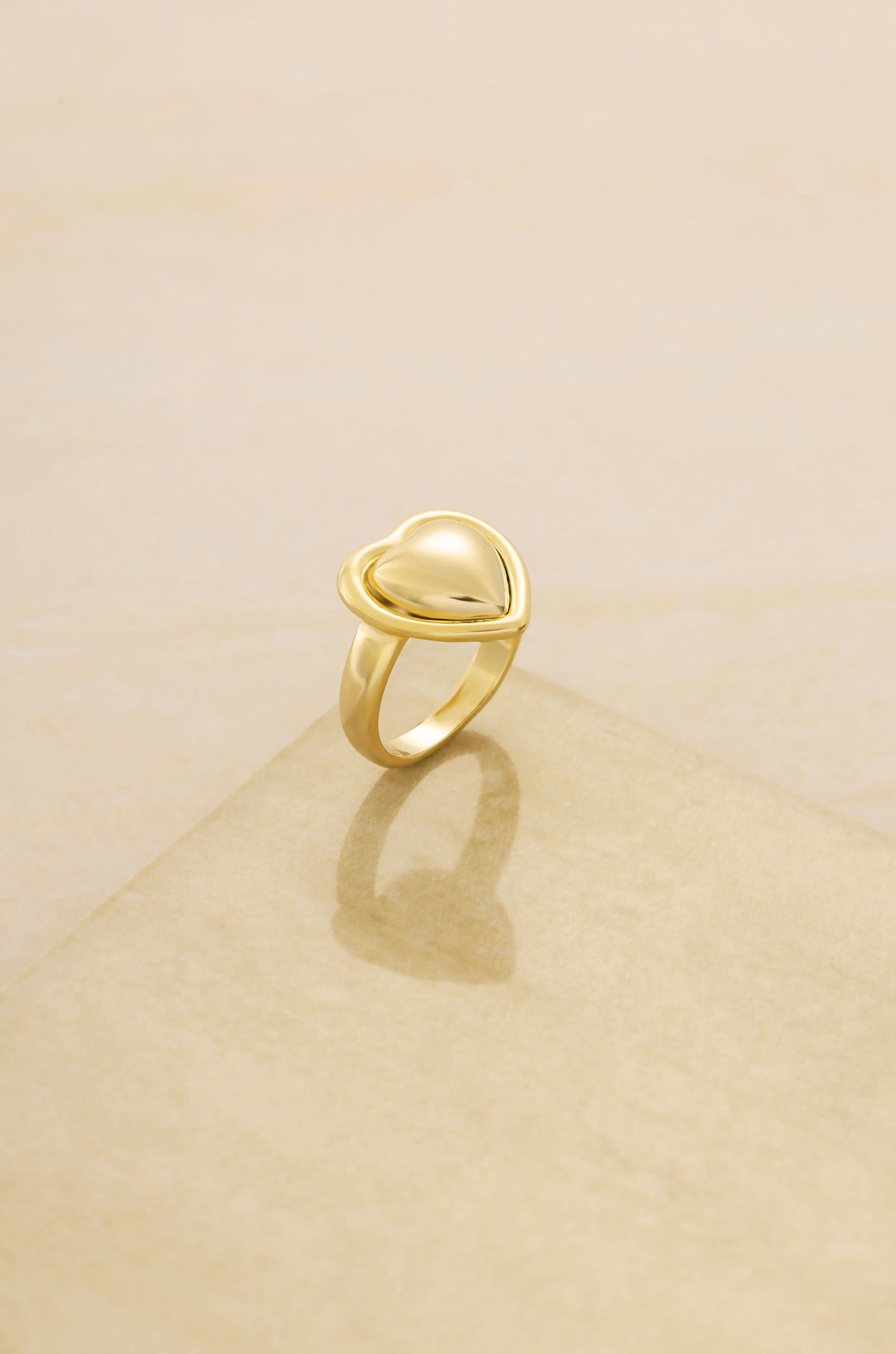 Full Heart 18k Gold Plated Ring on slate background