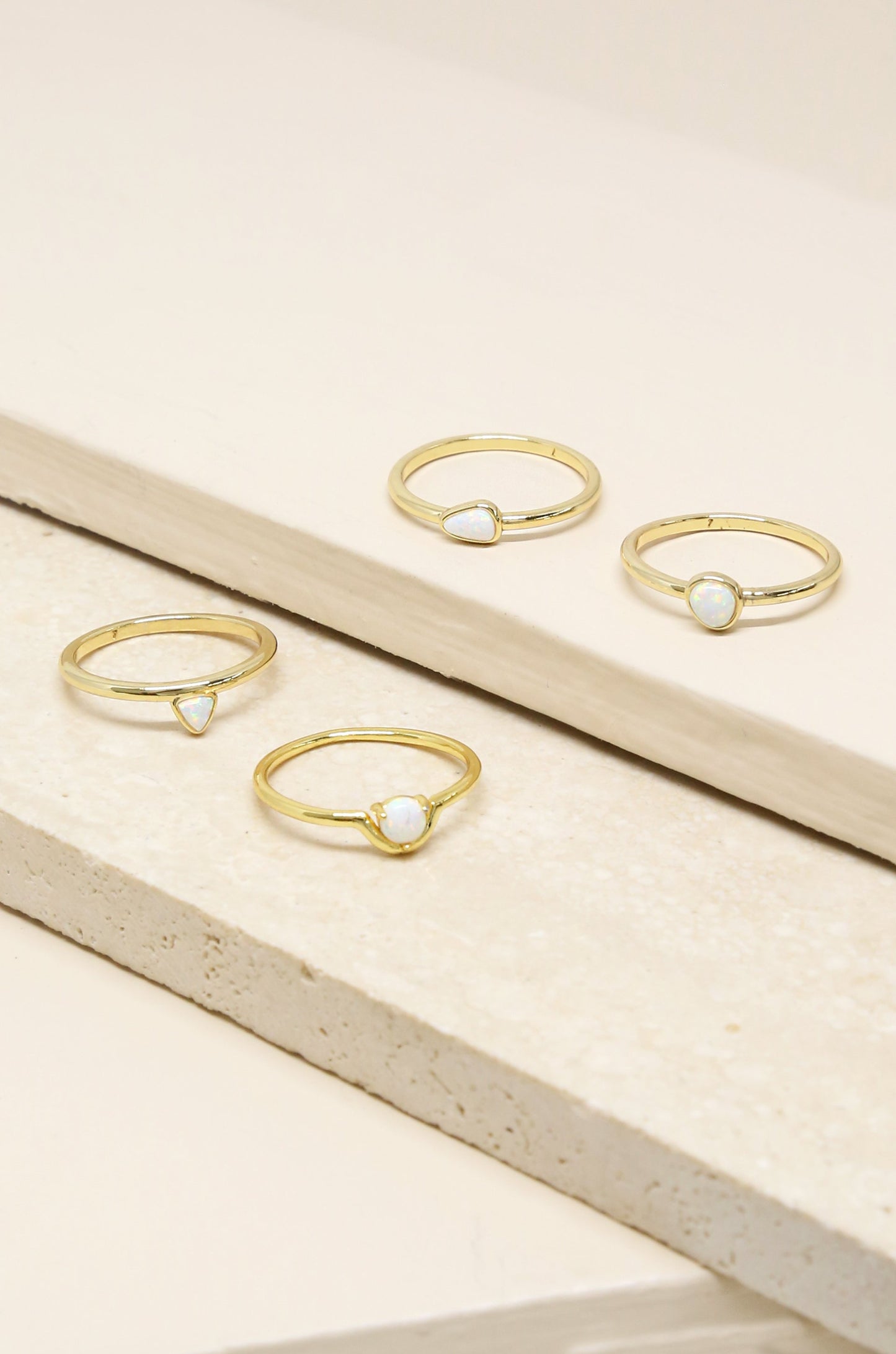 True Opal Stackers 18k Gold Plated Ring Set of 4 on slate background
