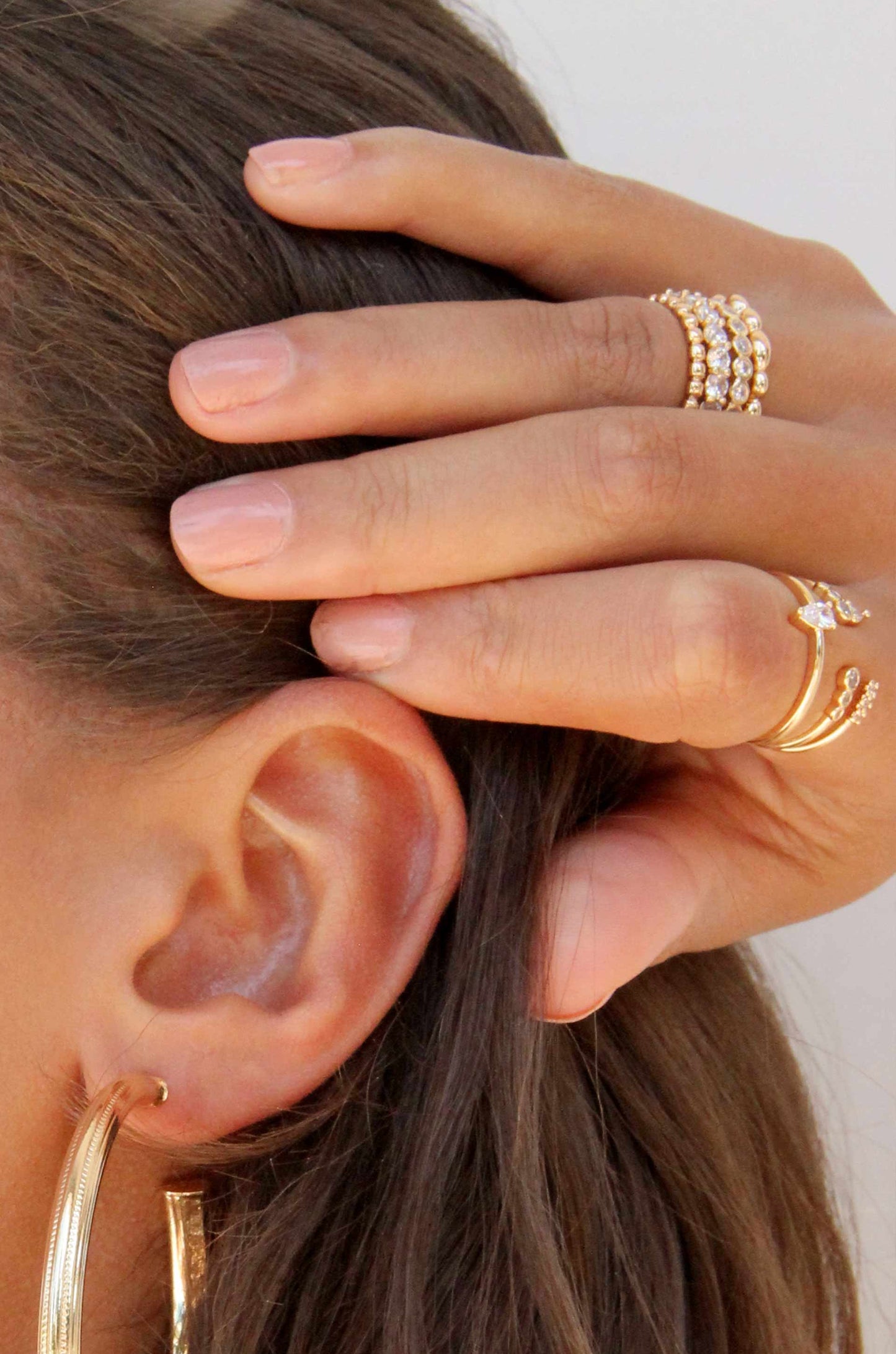 Mini Crystal Essentials 18k Gold Plated Ring Stack shown on a model