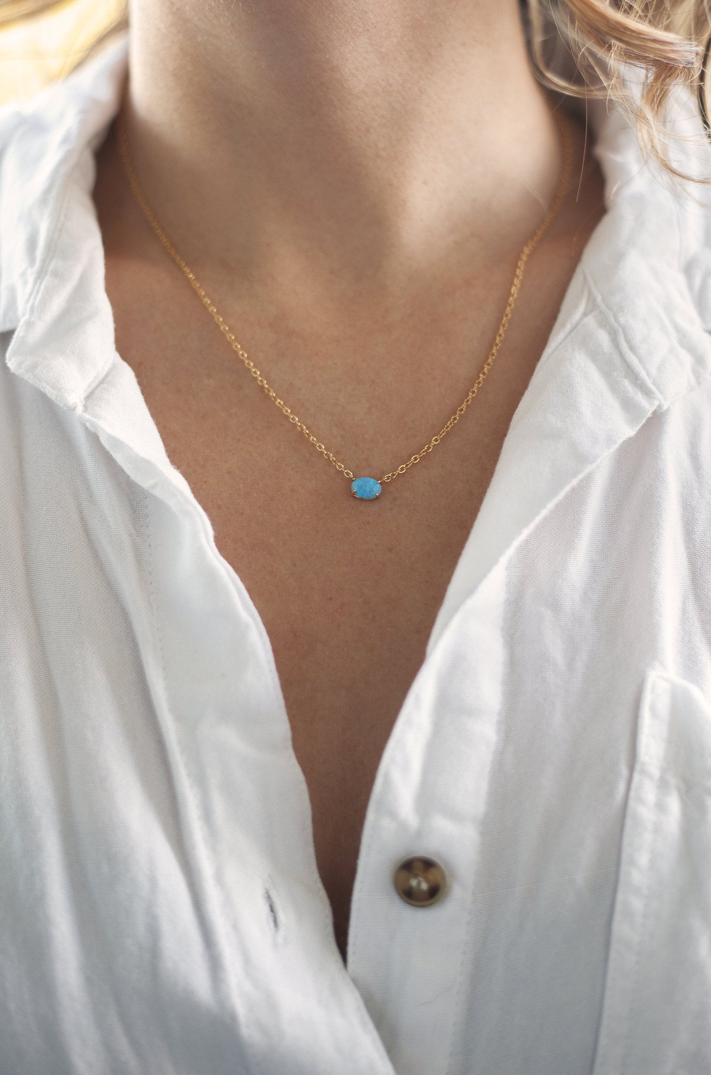 Keepsake Kyocera Opal & 18kt Gold Plated Necklace in blue opal on model