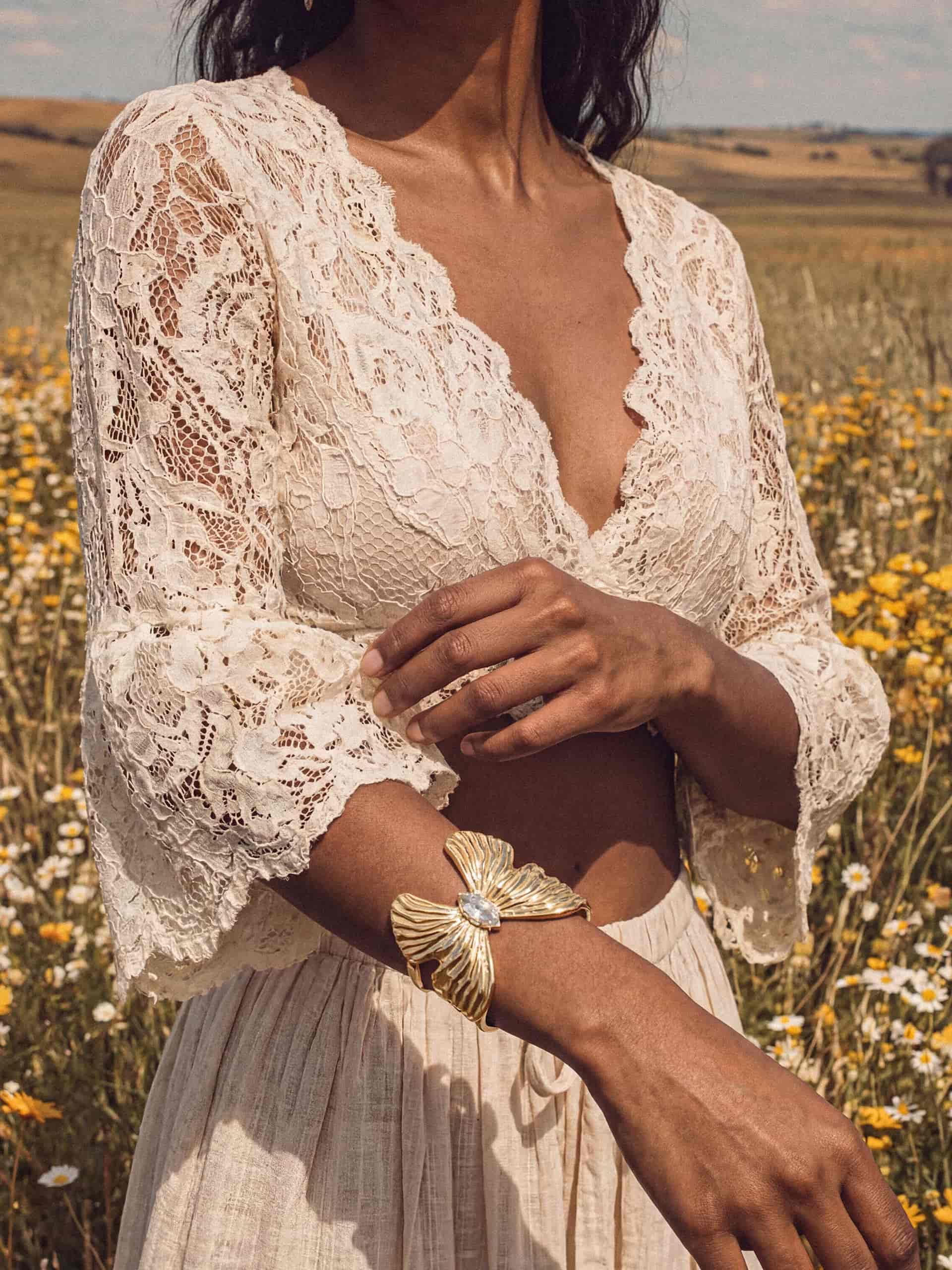 Butterfly cuff bracelet styled with lace dress