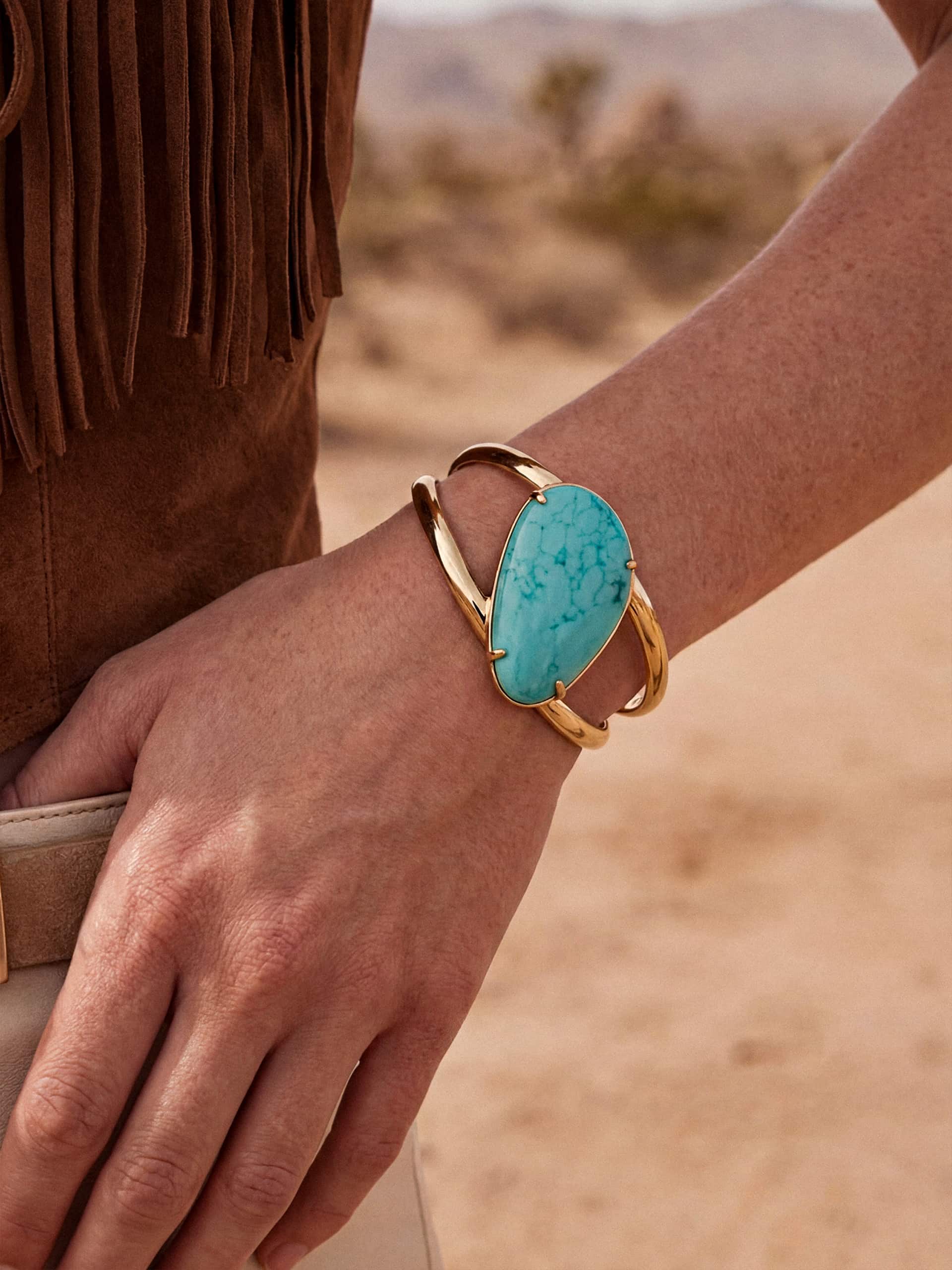 Turquoise cuff bracelet on wrist
