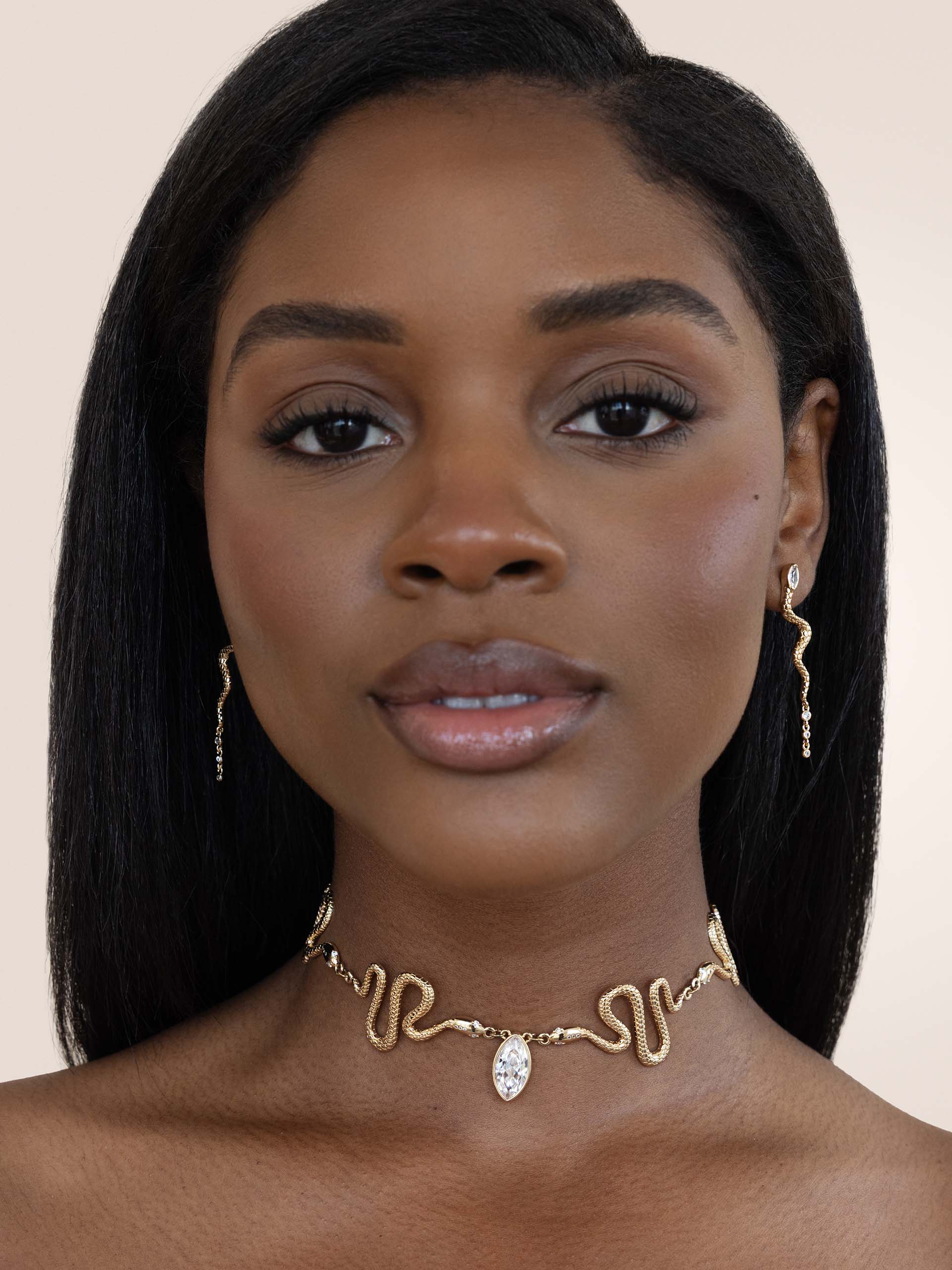 Serpentina Earrings Clear Crystal with 18k Gold Plating on model 4