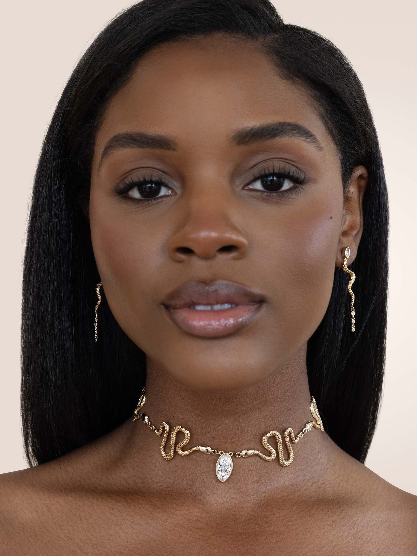 Serpentina Earrings Clear Crystal with 18k Gold Plating on model 4