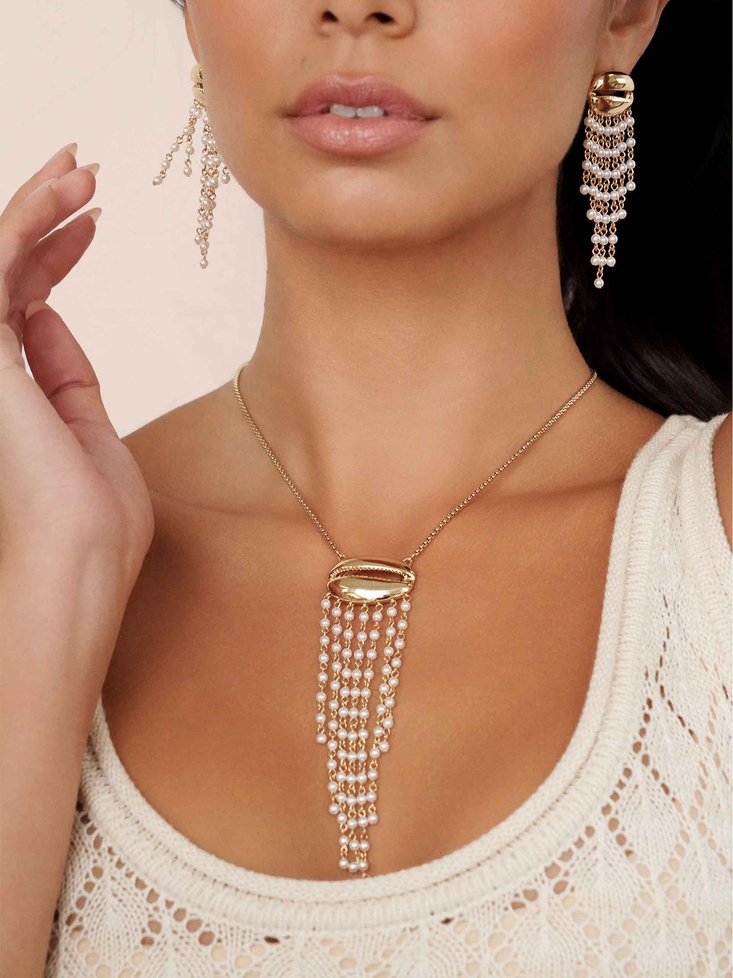 Mykonos Shell Dangle Earrings on model 3