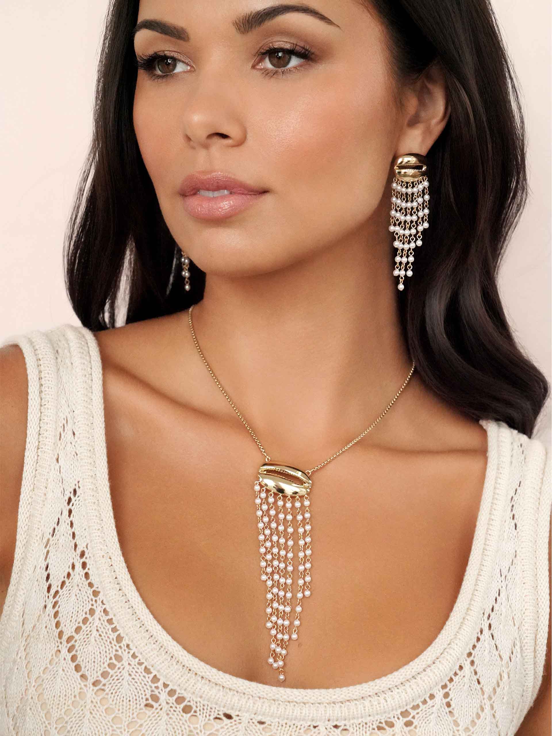 Mykonos Shell Dangle Earrings on model 4
