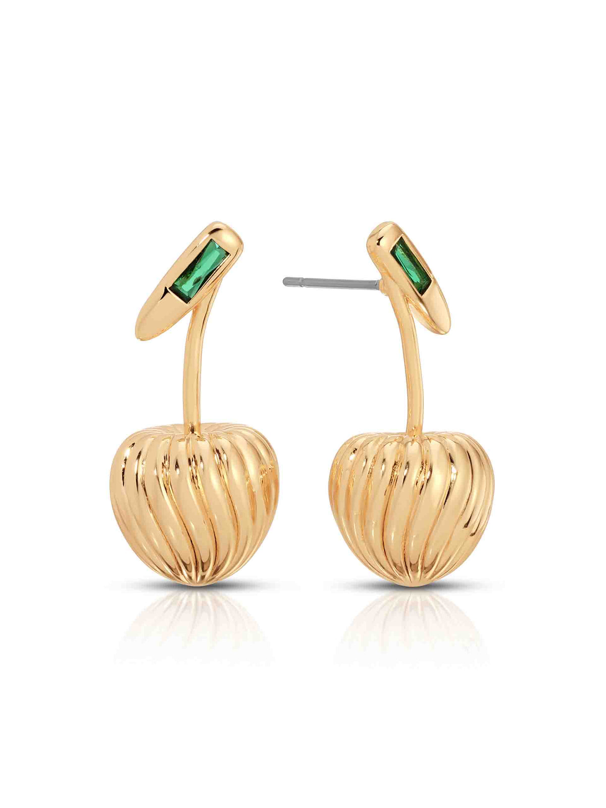 Pair of gold cherry-shaped drop earrings with ribbed, sculptural bodies and rectangular emerald-green gemstone studs, displayed on white; elegant, playful luxury jewelry.