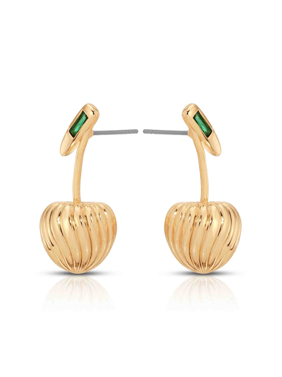 Pair of gold cherry-shaped drop earrings with ribbed, sculptural bodies and rectangular emerald-green gemstone studs, displayed on white; elegant, playful luxury jewelry.