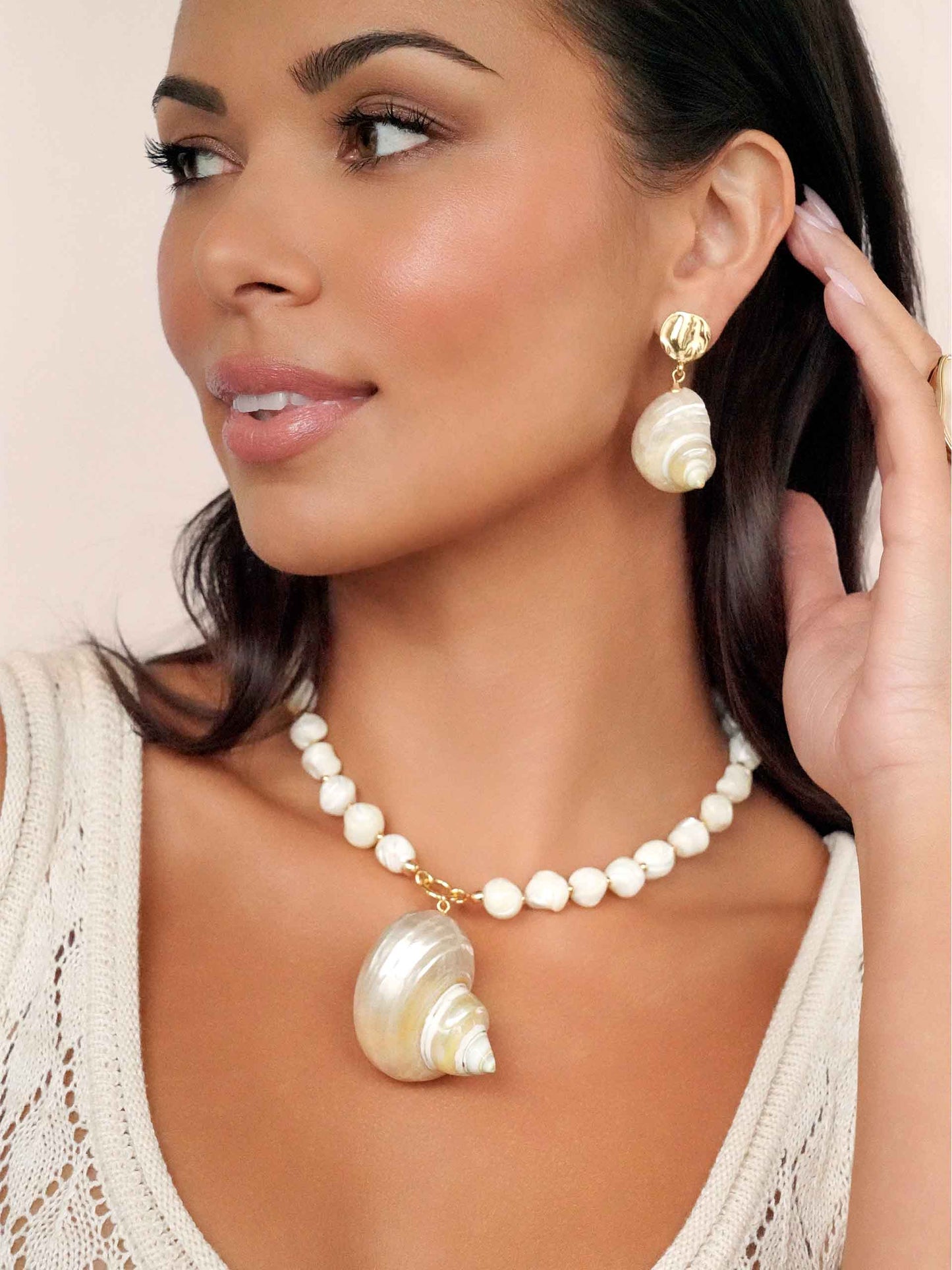 Sunken Treasure Shell Earrings on model 2