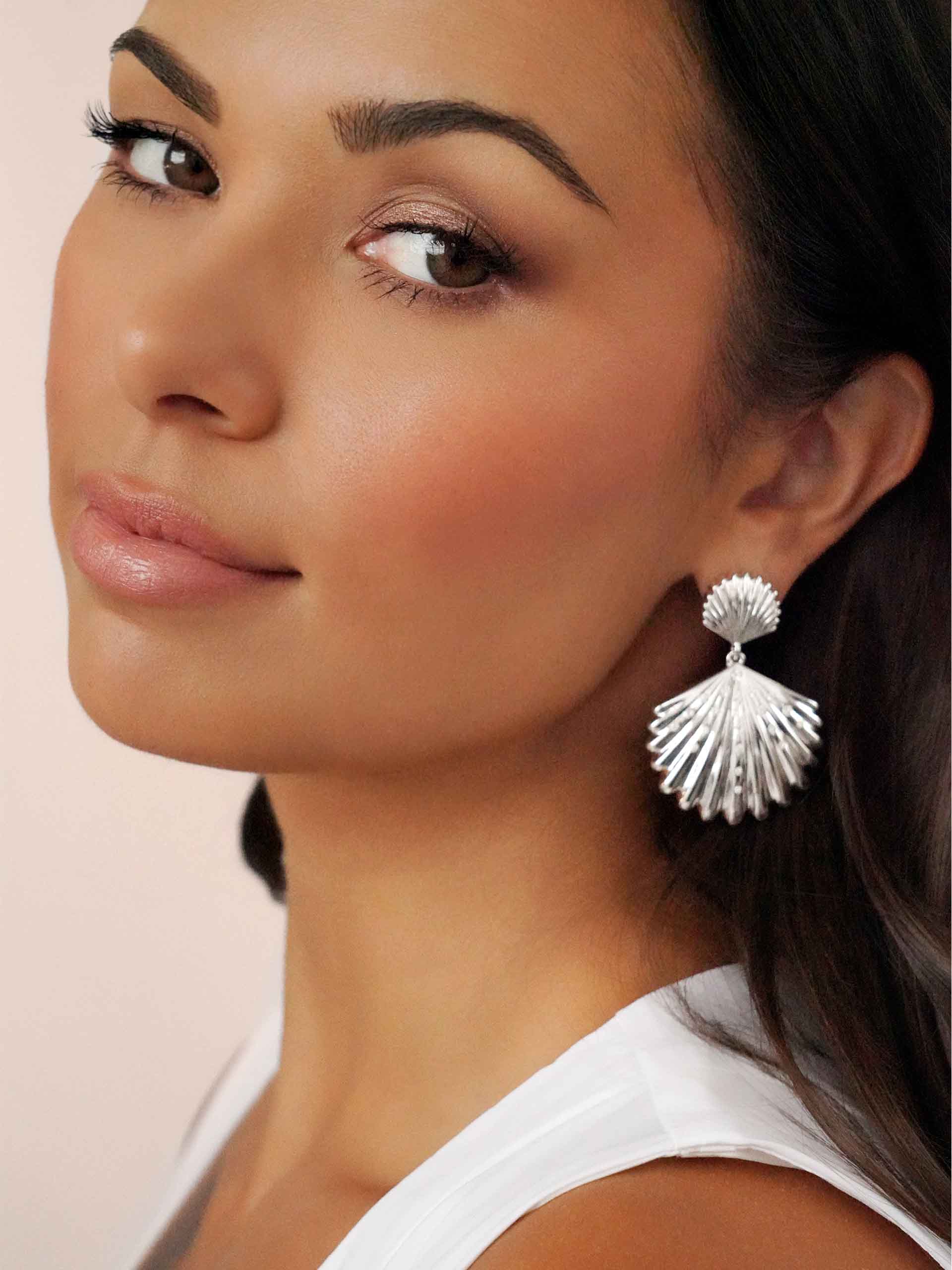 Sun-drenched Shell Earrings rhodium on model
