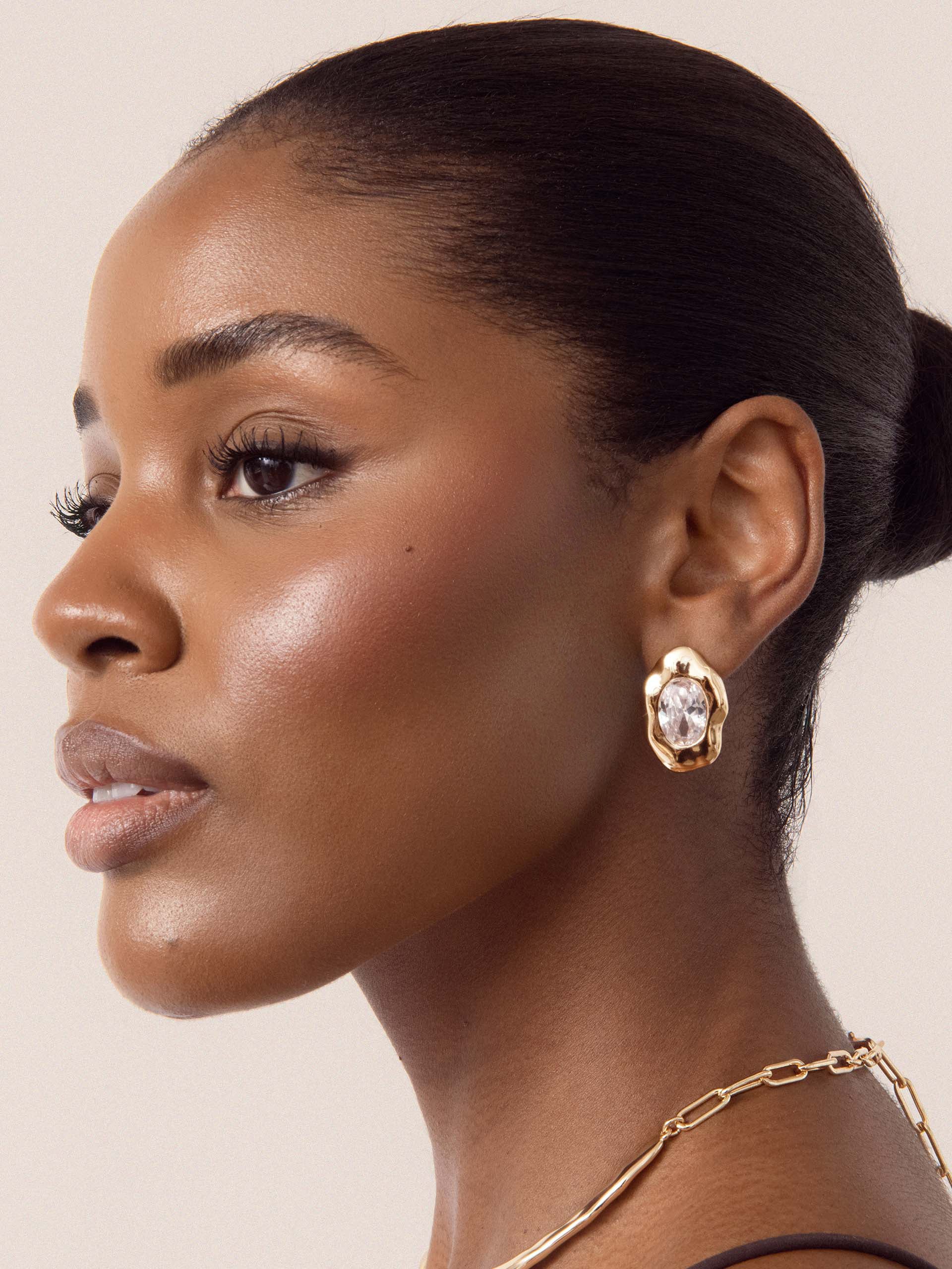 Molten Glow Crystal Studs Clear Crystal with 18k Gold Plating on model 2