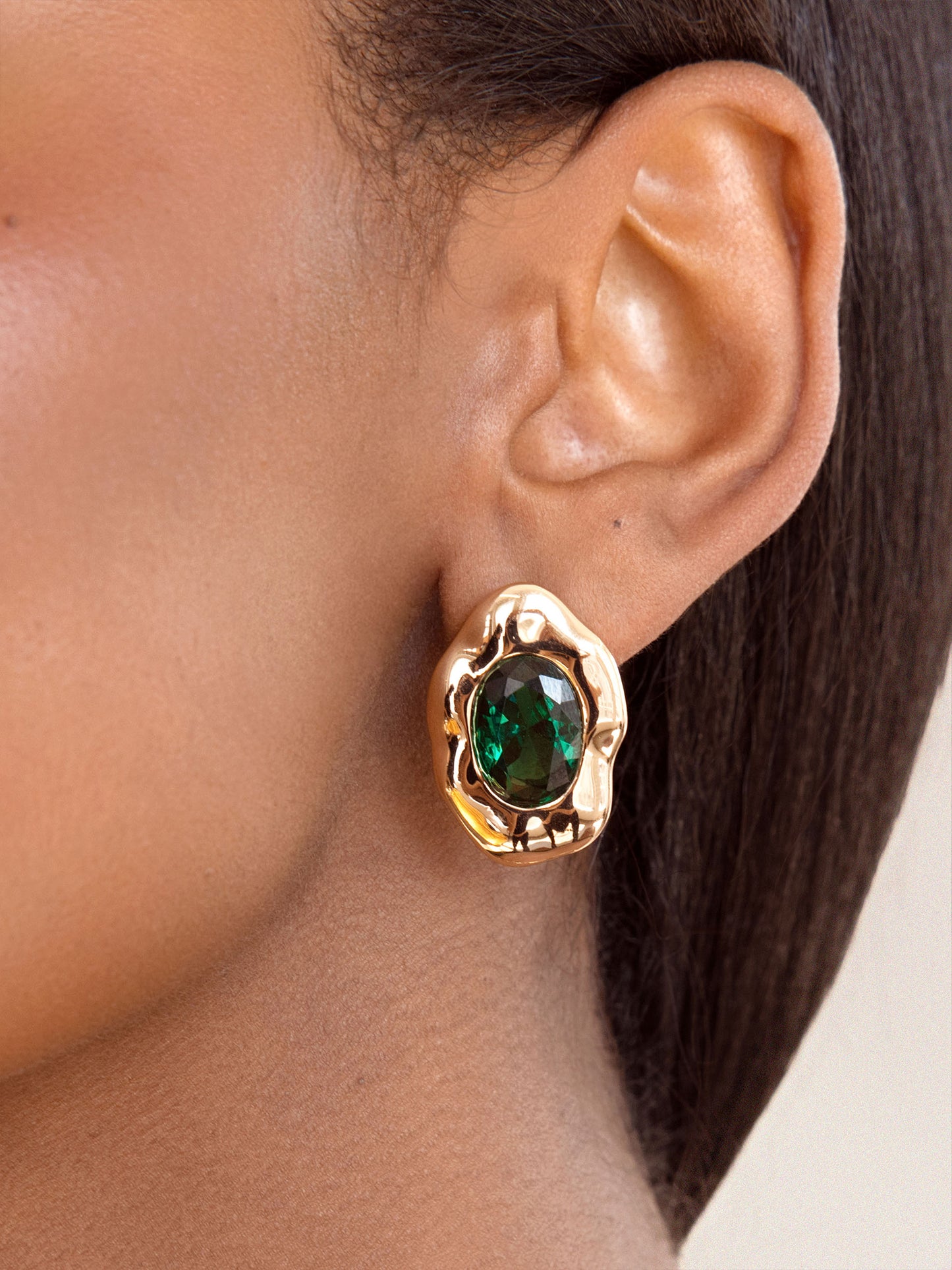 Molten Glow Crystal Studs Emerald Crystal with 18k Gold Plating on model 1