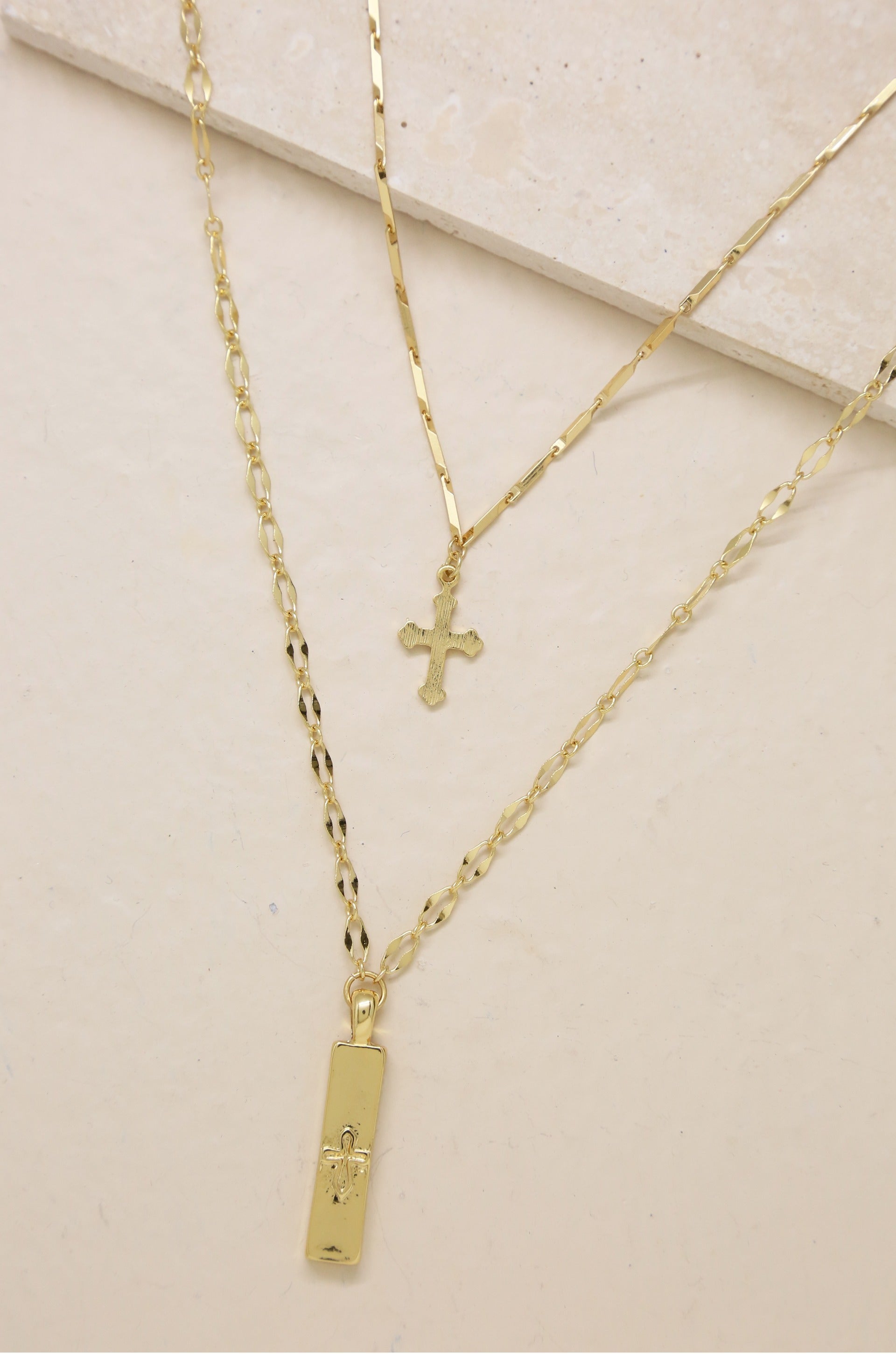 Your Highness 18k Gold Plated Cross Necklace Set on slate