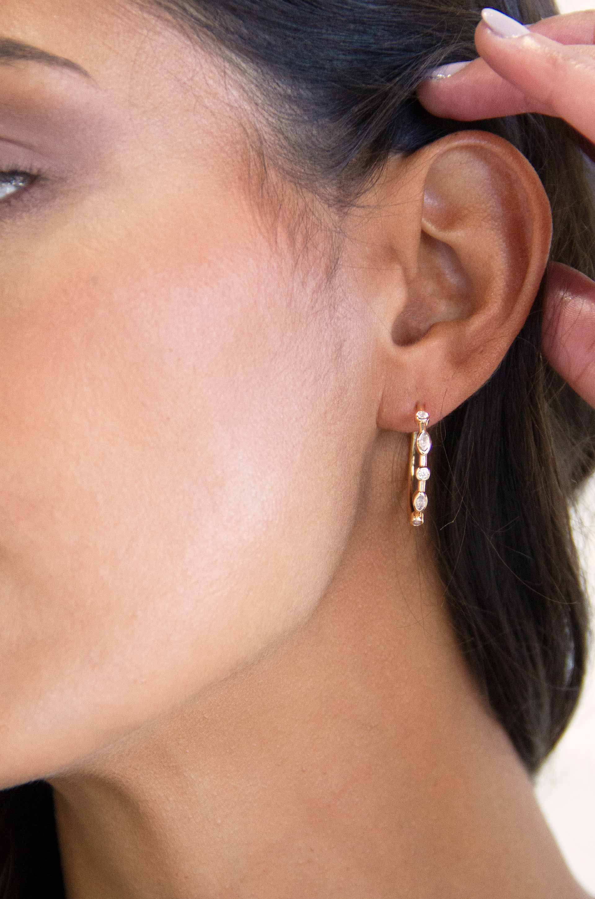 Crystal Queen 18k Gold Plated Hoop Earrings on model